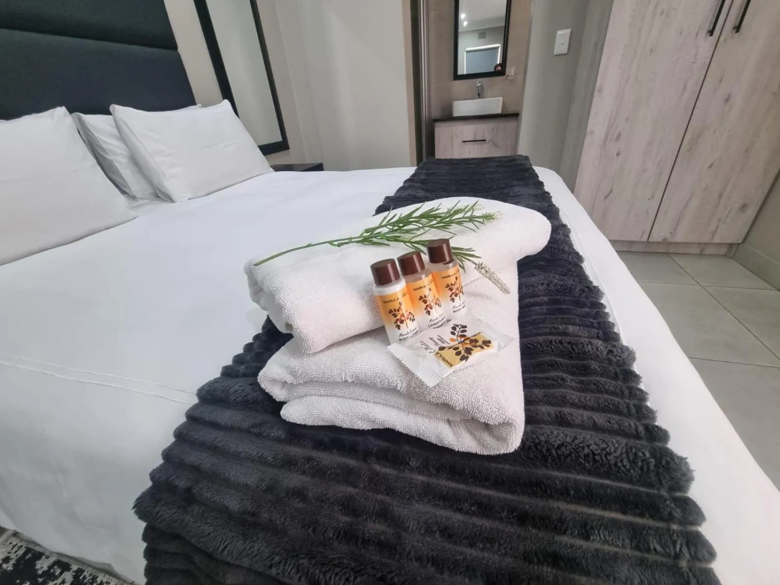 towels, Bed in Emerald Guesthouse