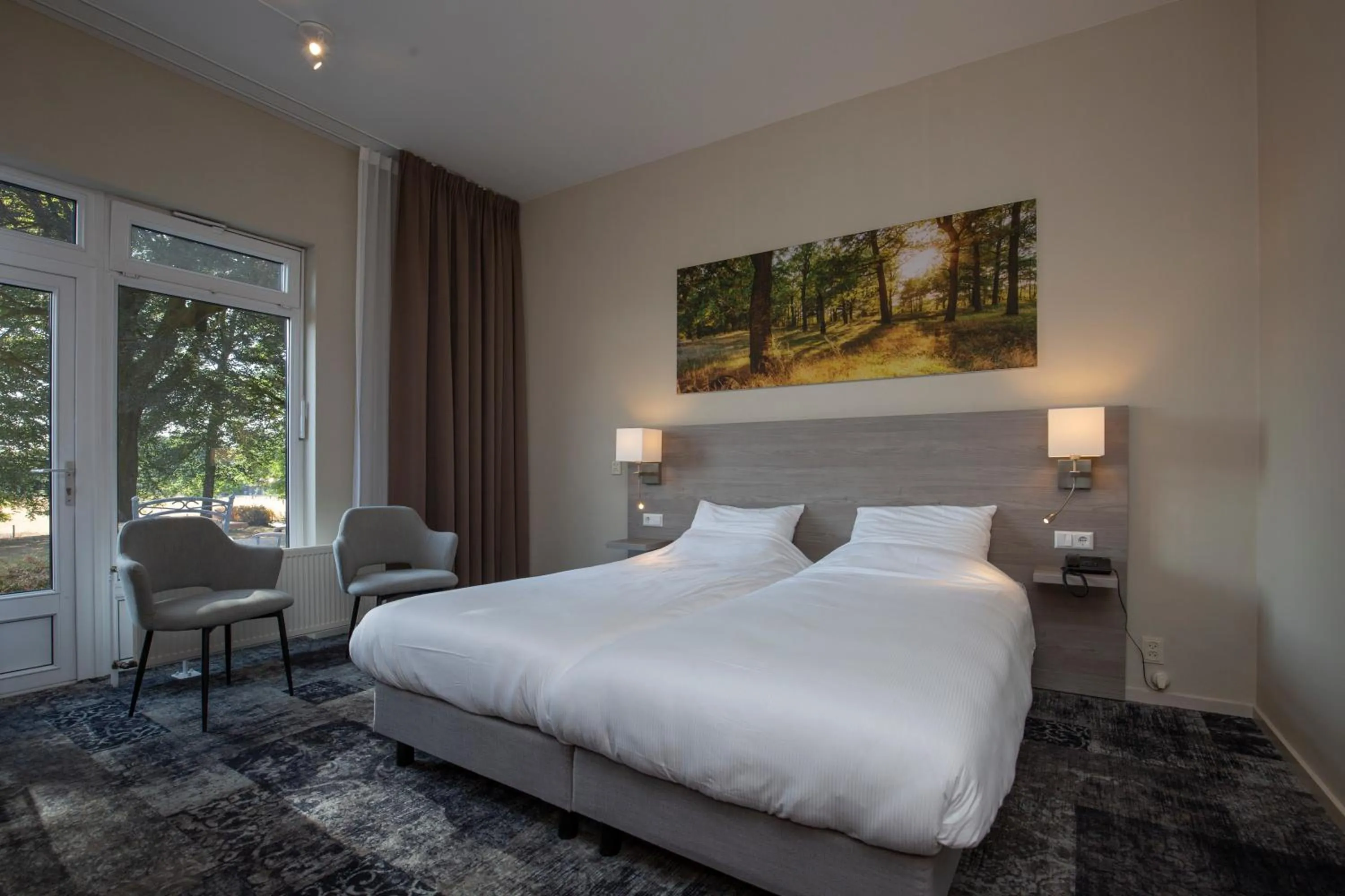 Bed in Fletcher Hotel Restaurant Paasberg