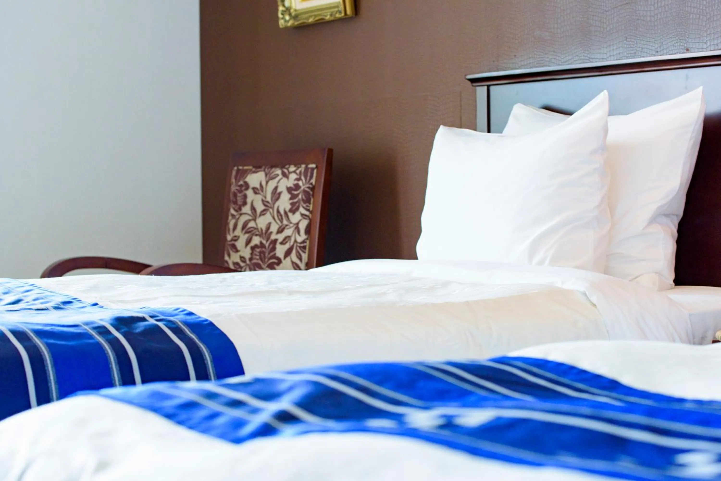 Bed in Best Western Okinawa Kouki Beach