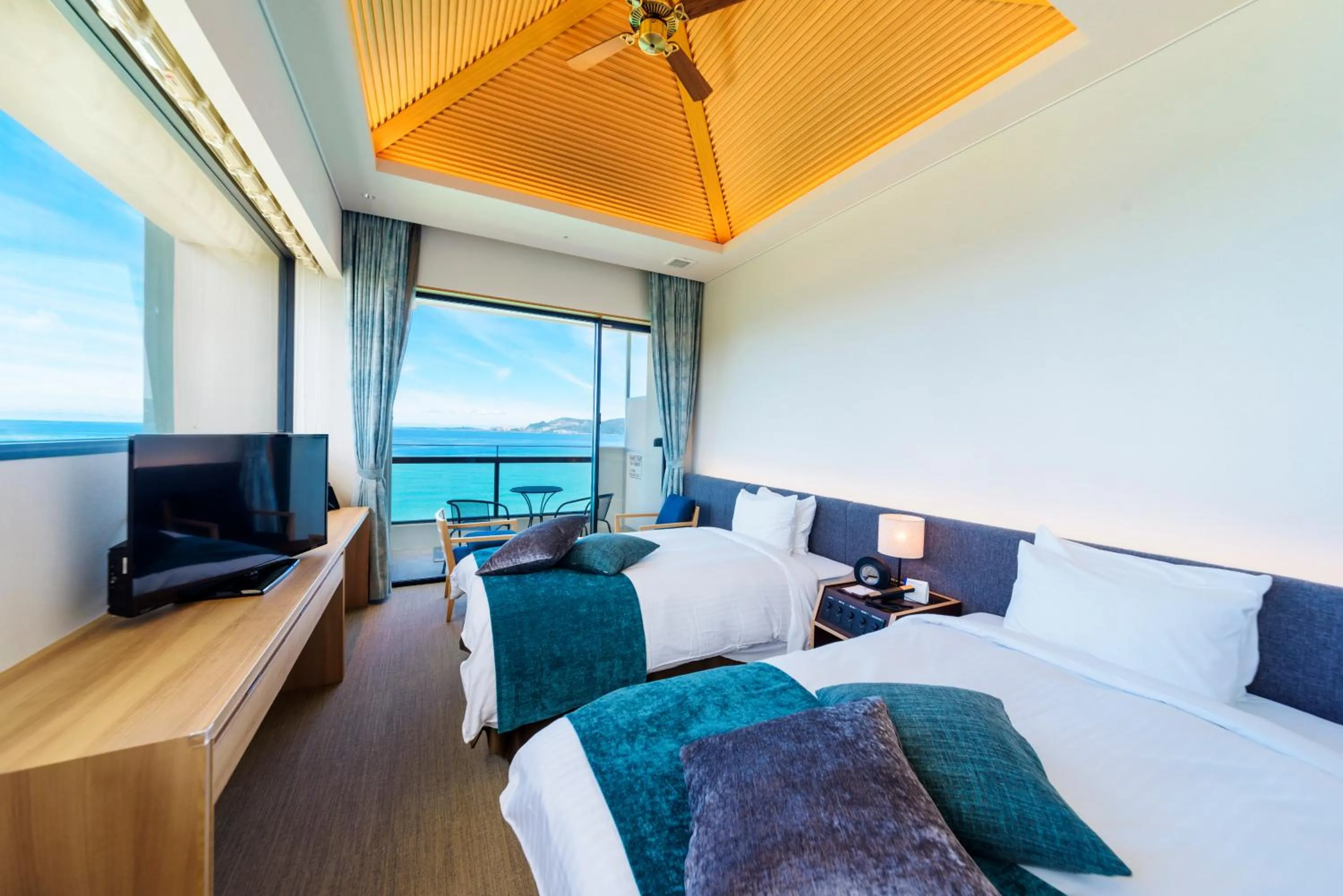 Photo of the whole room, Bed in Best Western Okinawa Kouki Beach