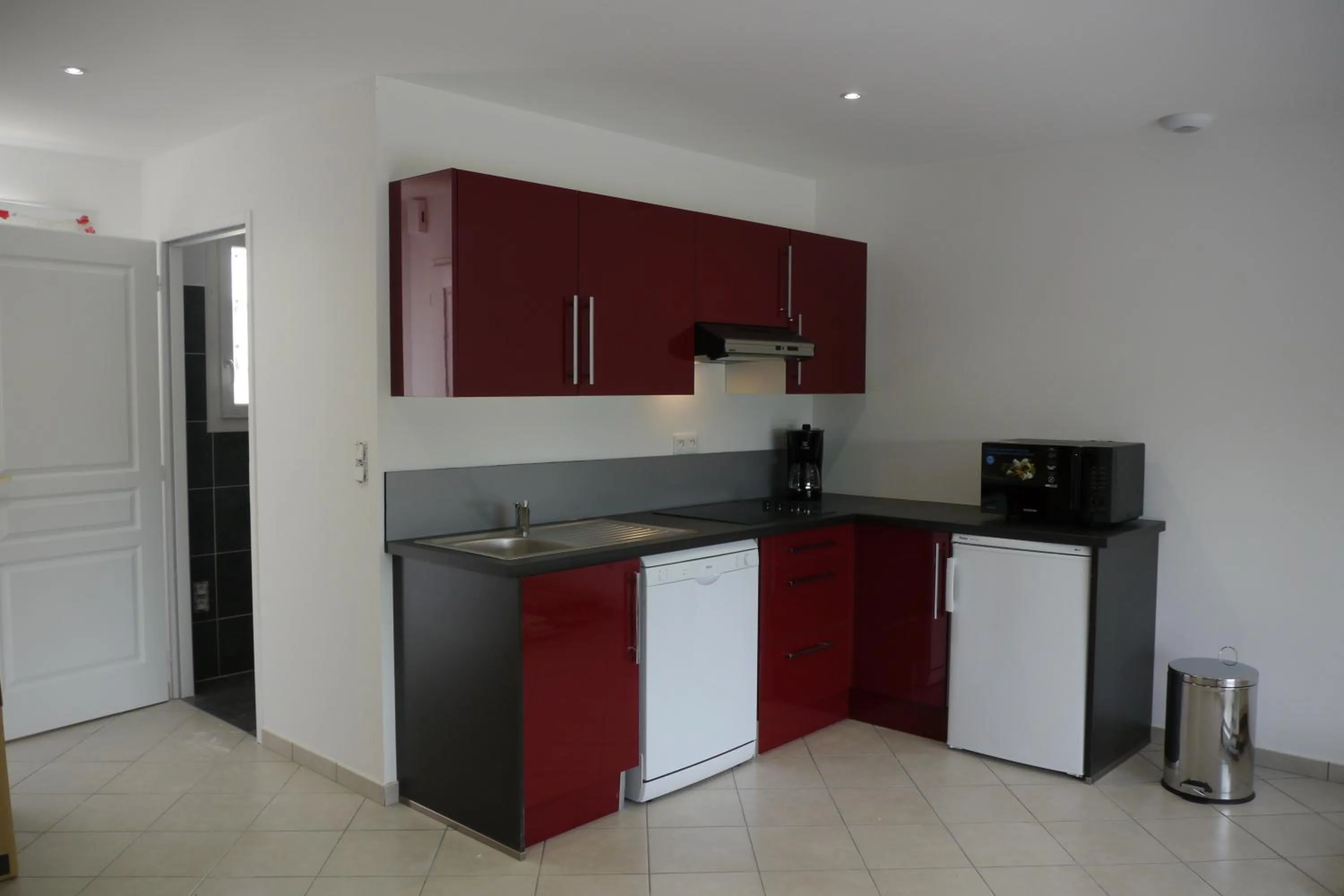 Kitchen or kitchenette in La Résidence Les Grands Vignobles