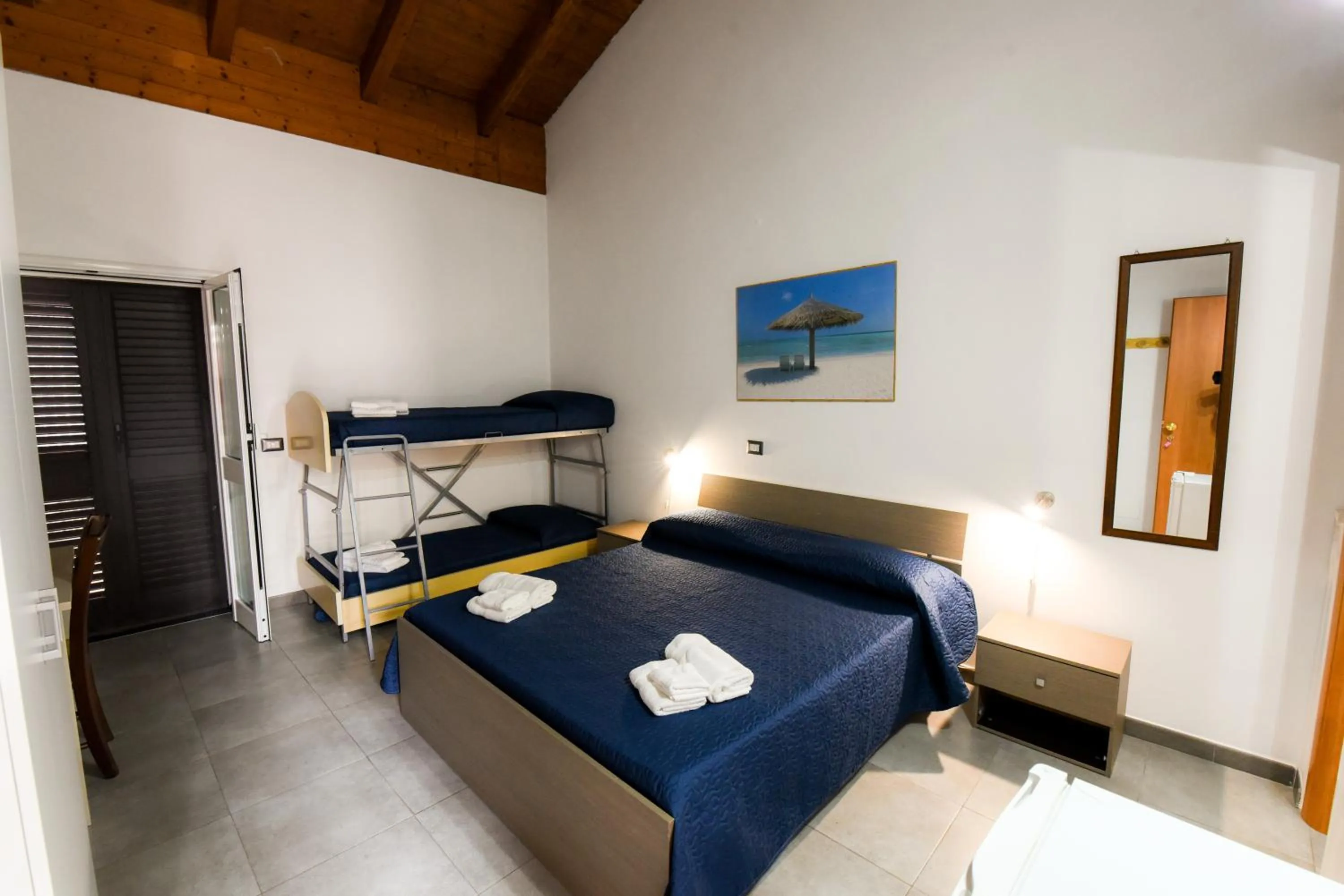 Bed in Giardini Sausari Residence