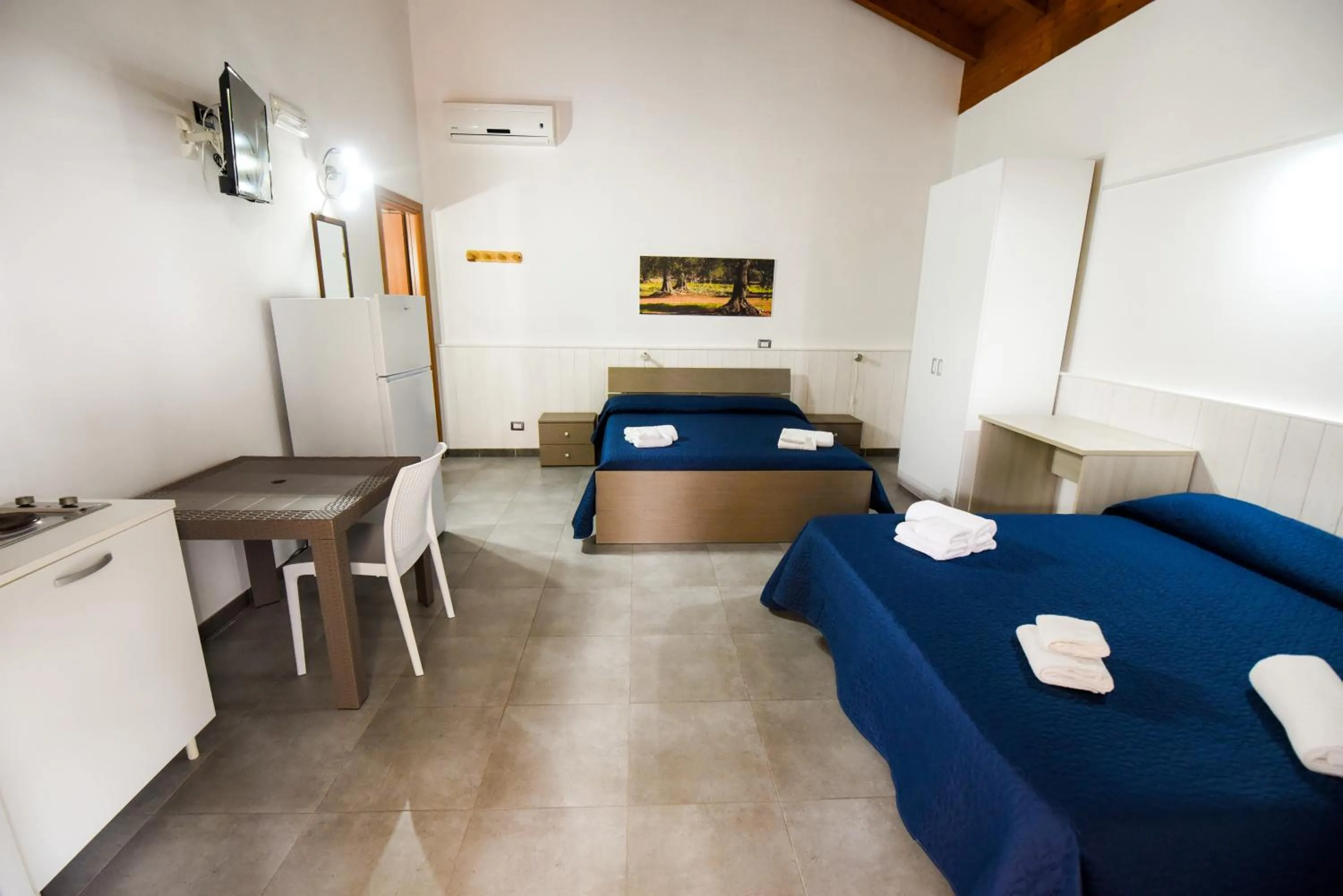 Bed in Giardini Sausari Residence