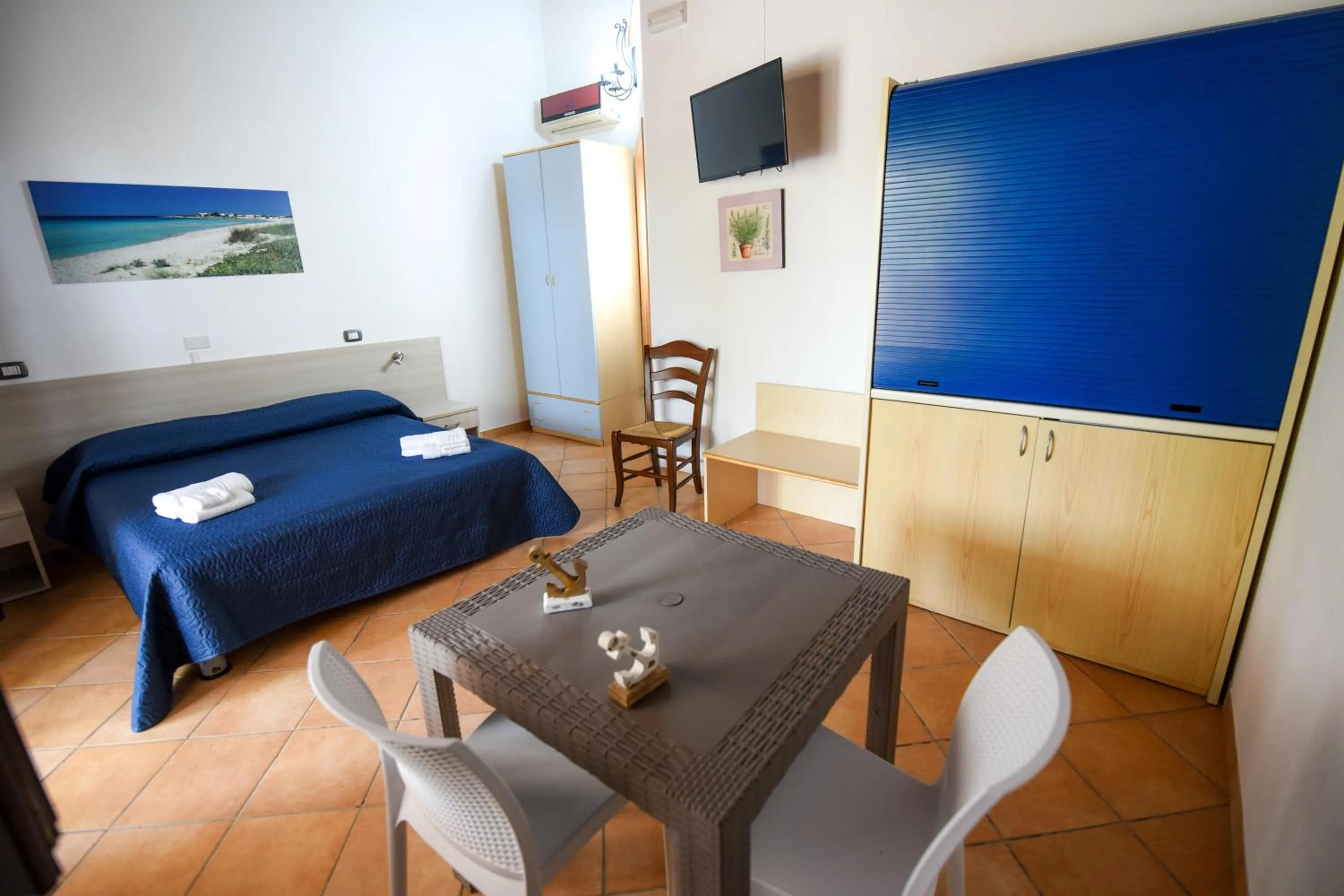 Bed in Giardini Sausari Residence