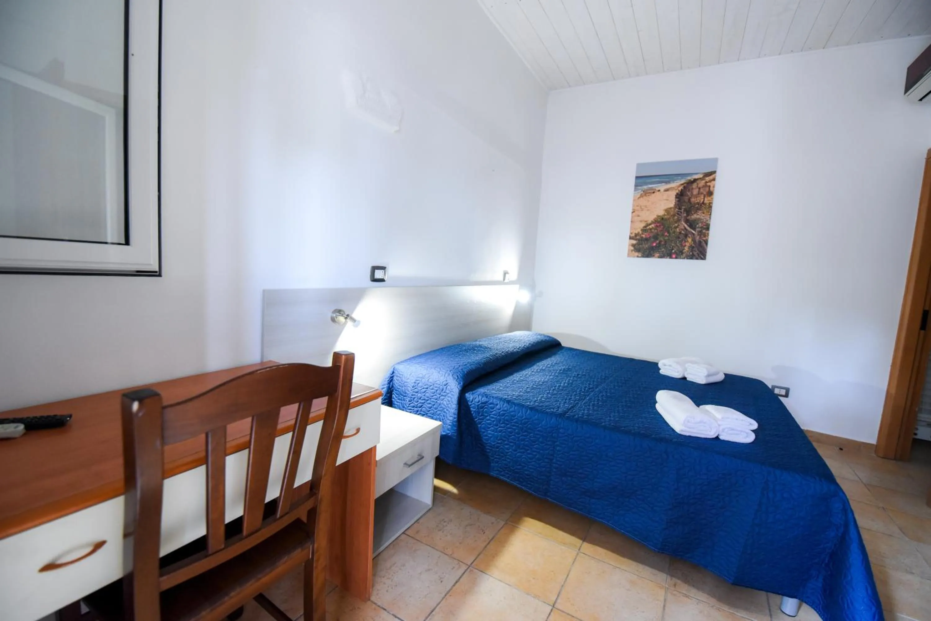 Bed in Giardini Sausari Residence