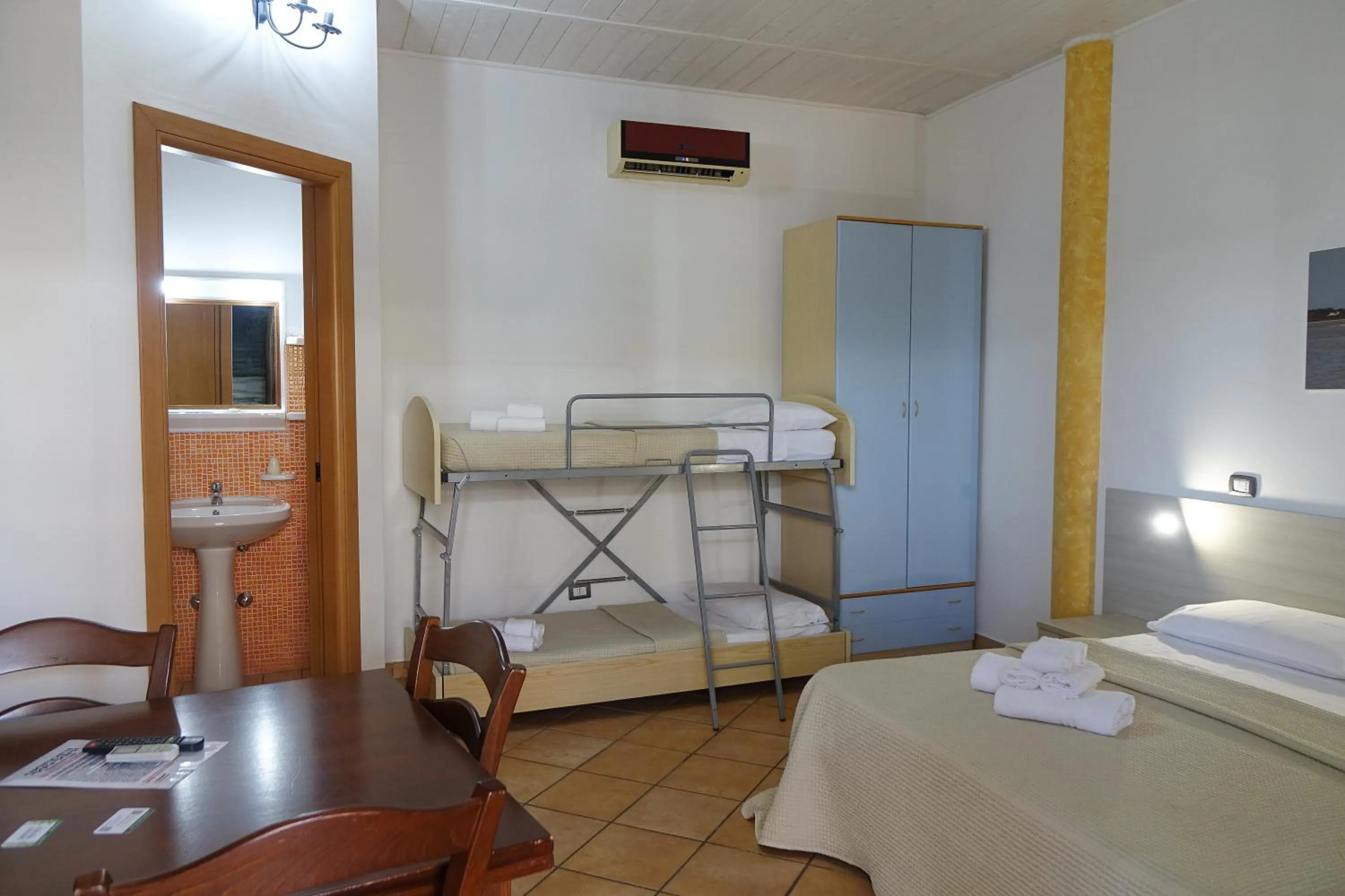 Bed in Giardini Sausari Residence