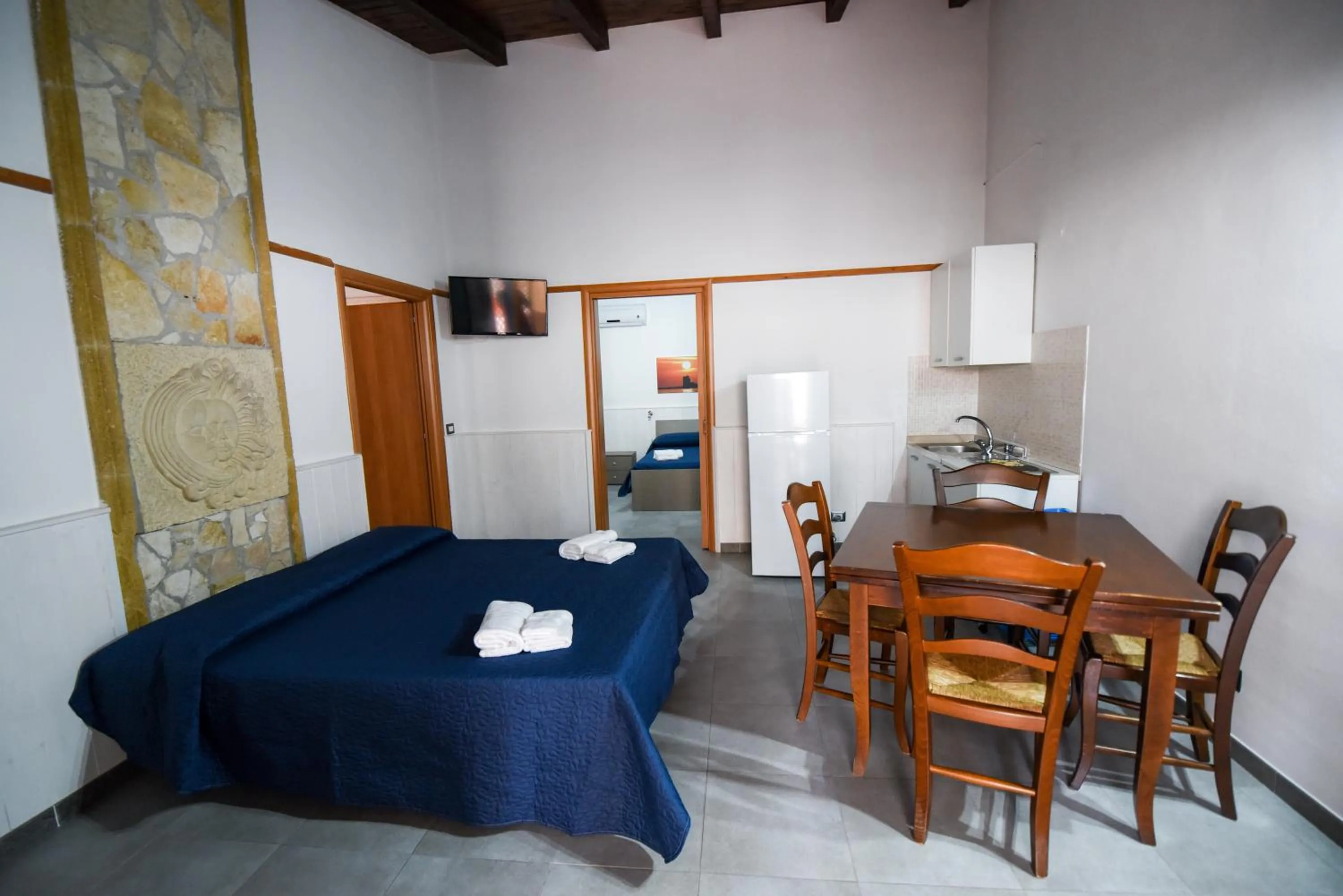 Bed in Giardini Sausari Residence