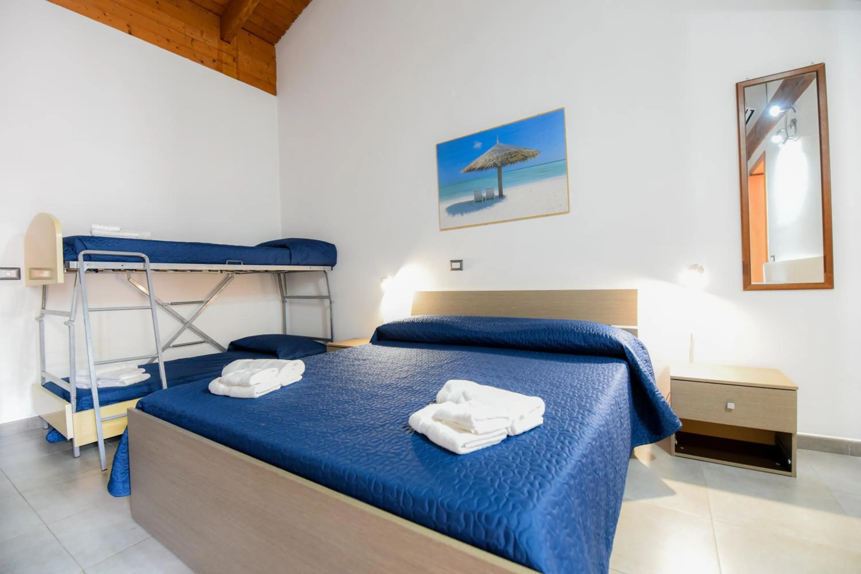 Bed in Giardini Sausari Residence