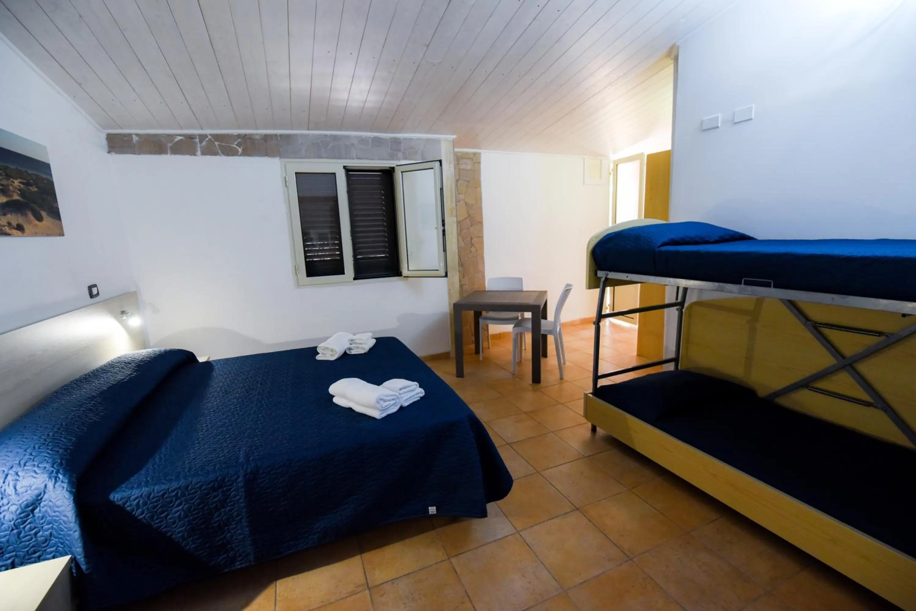 Bed in Giardini Sausari Residence