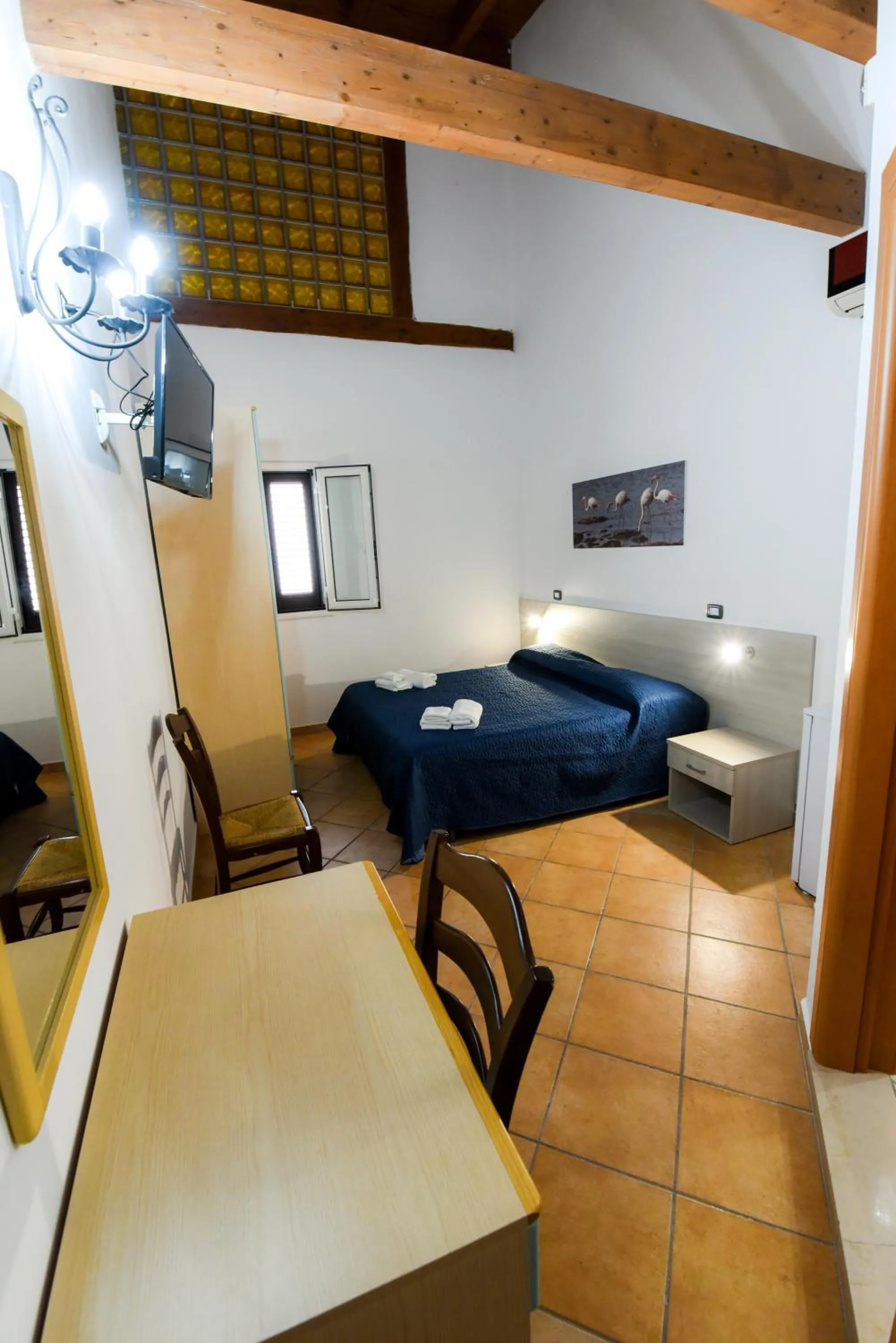 Bed in Giardini Sausari Residence