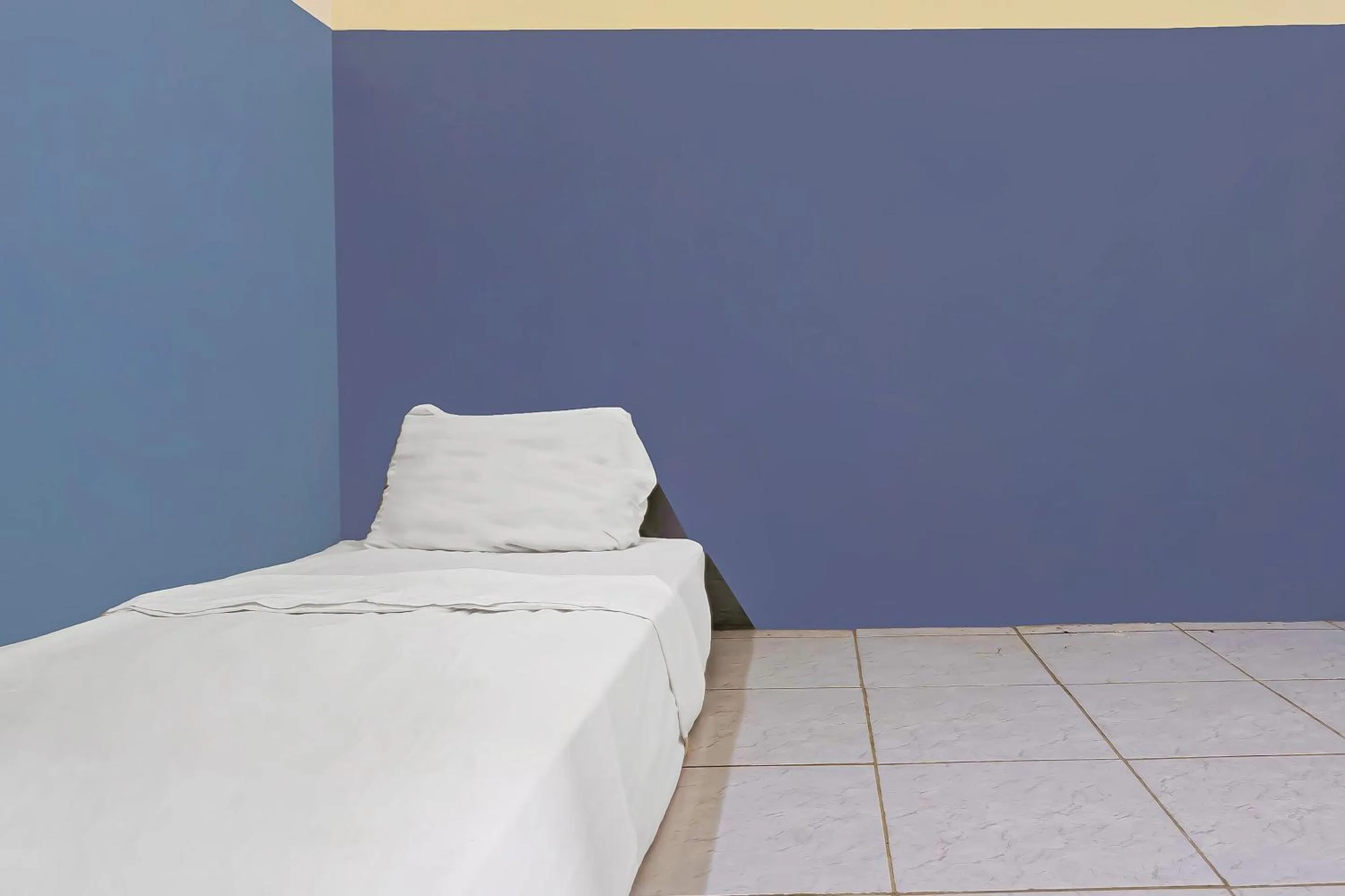 Bedroom in Hotel O Santana Residence Syariah