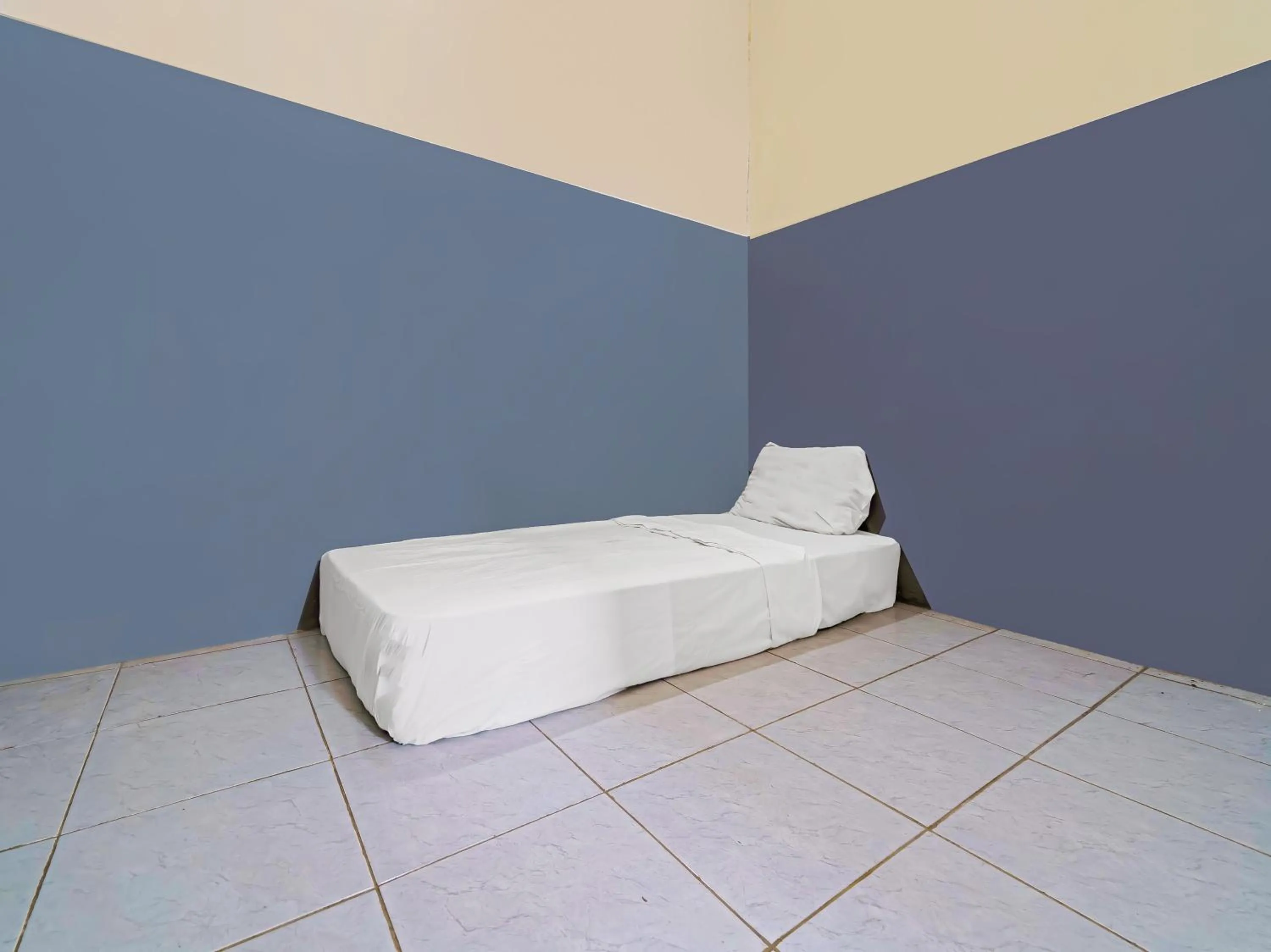 Bedroom in Hotel O Santana Residence Syariah