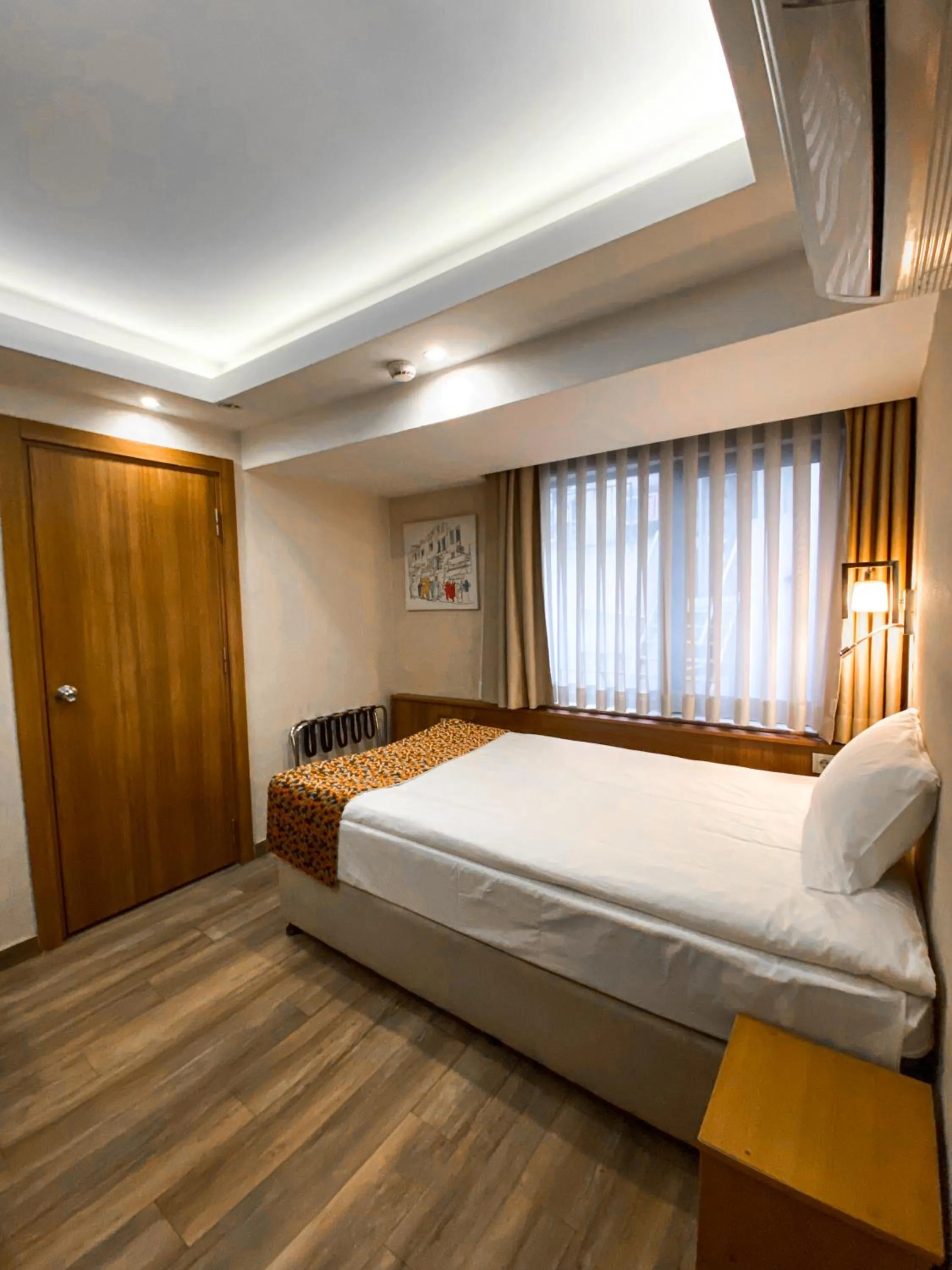Bed in BGuest Hotel & Residence