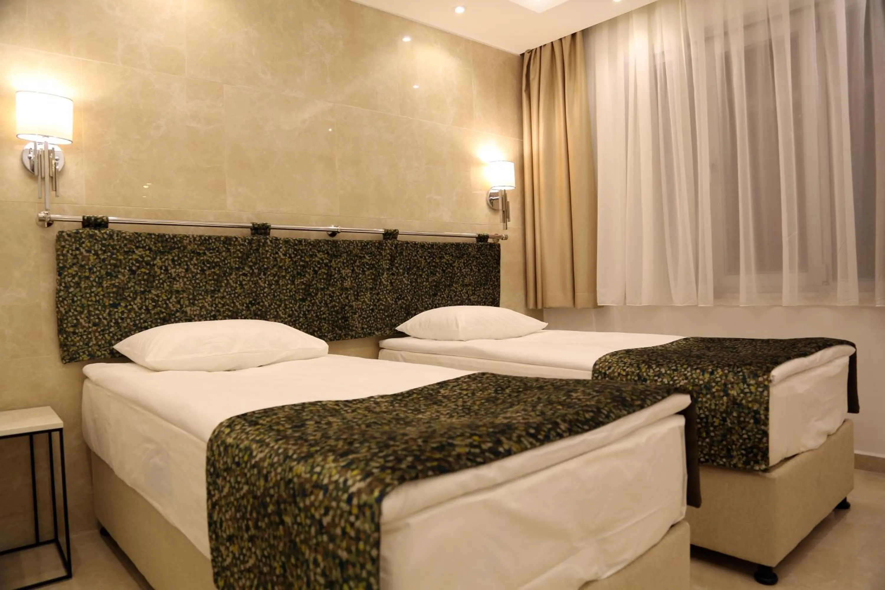 Photo of the whole room, Bed in BGuest Hotel & Residence