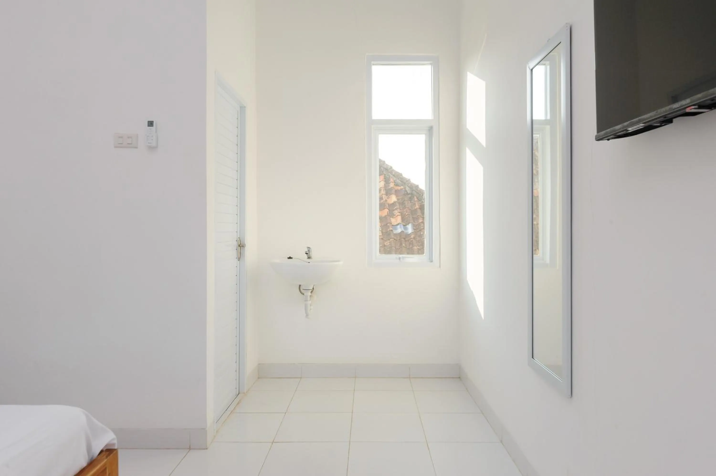 Bedroom in Urbanview Hotel Betego Syariah Enggal by RedDoorz