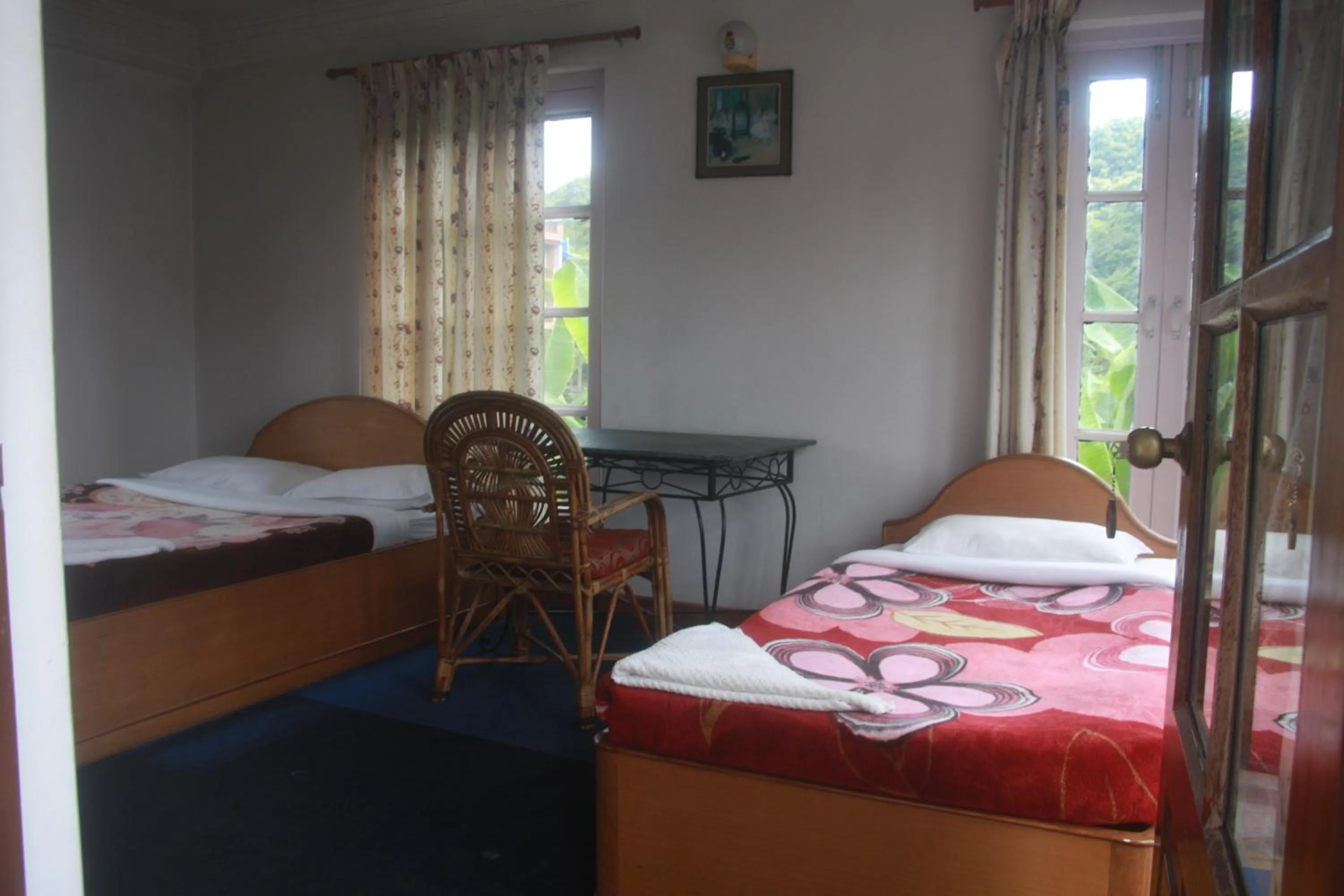 Bed in Vagabond Guest House