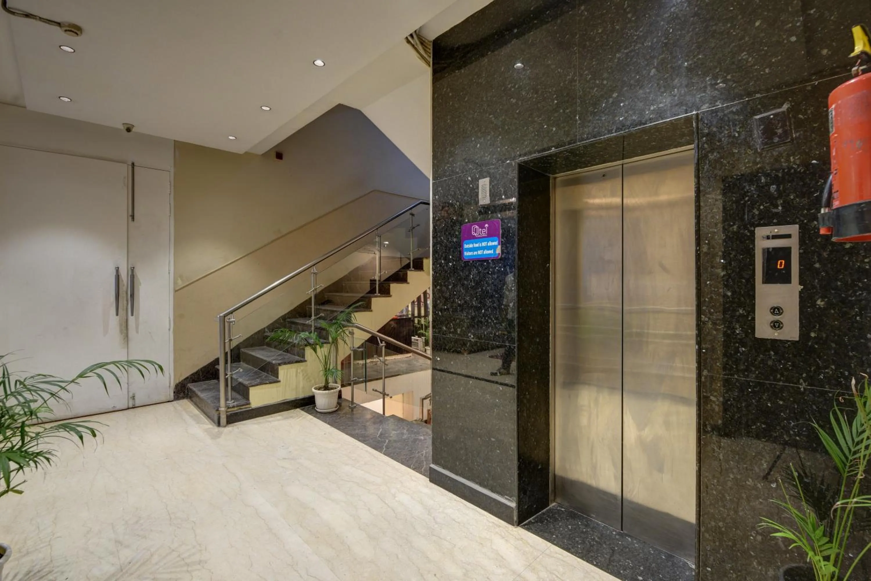 elevator in Qotel Comfort AT Residency Kaushambi Anand Vihar