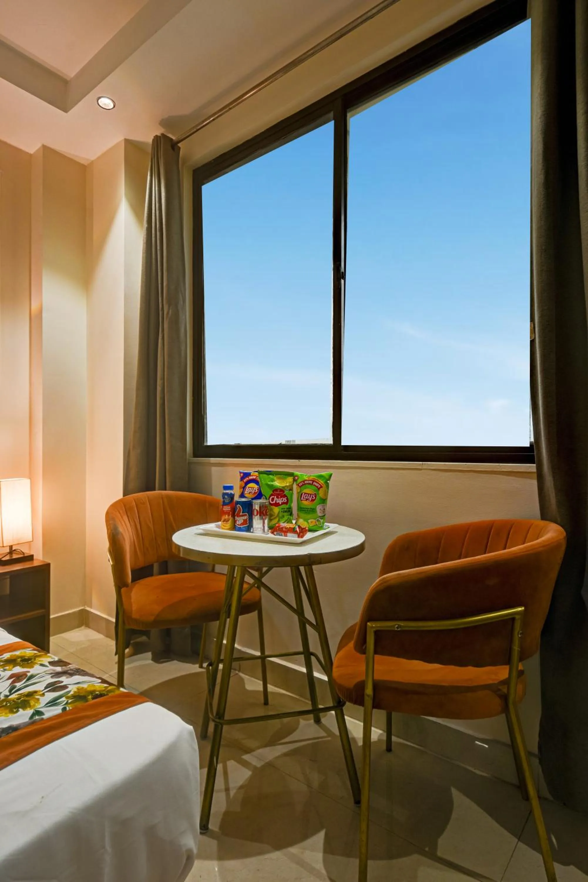 Seating area in Qotel Comfort AT Residency Kaushambi Anand Vihar