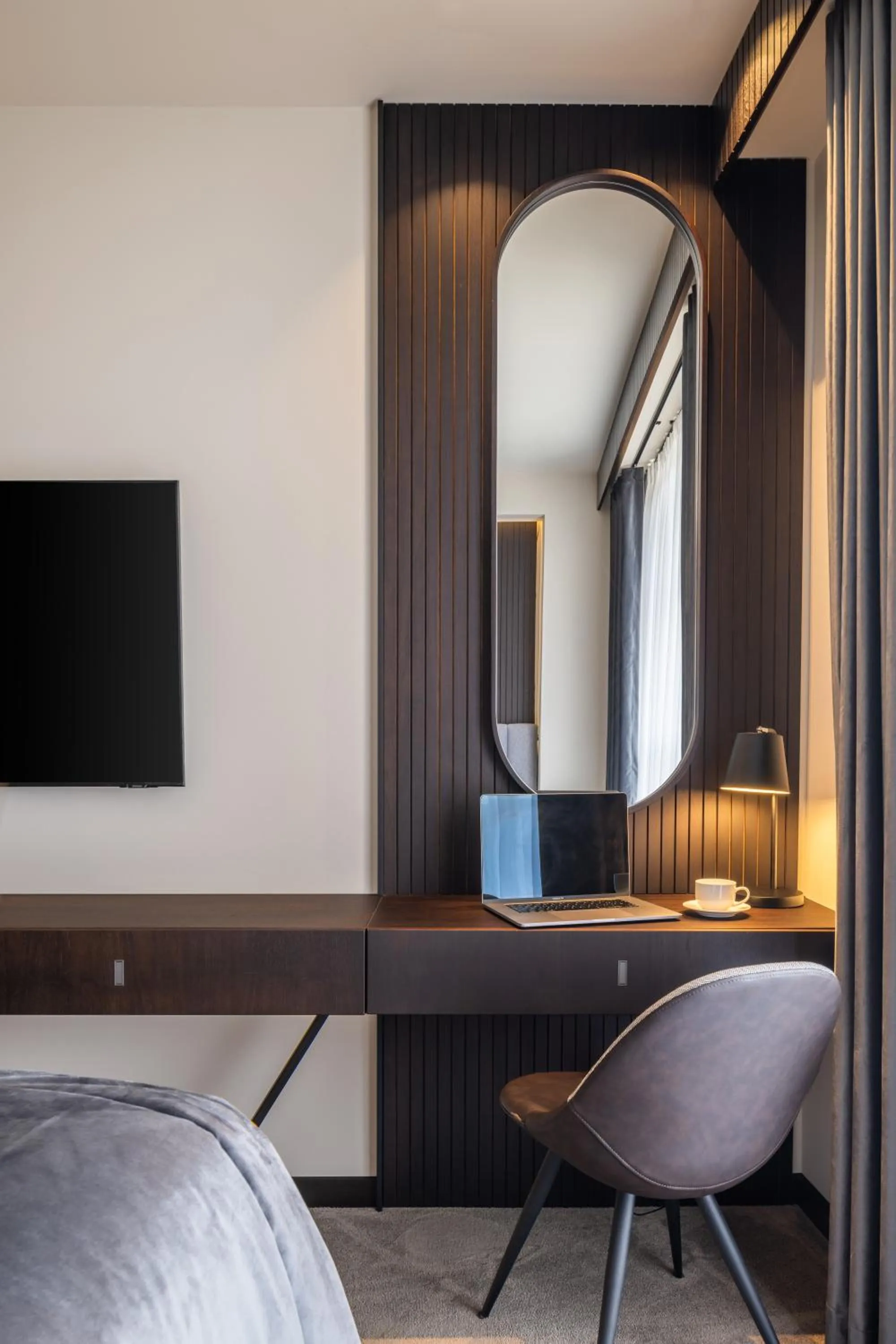 Communal lounge/ TV room in Derand Hotel