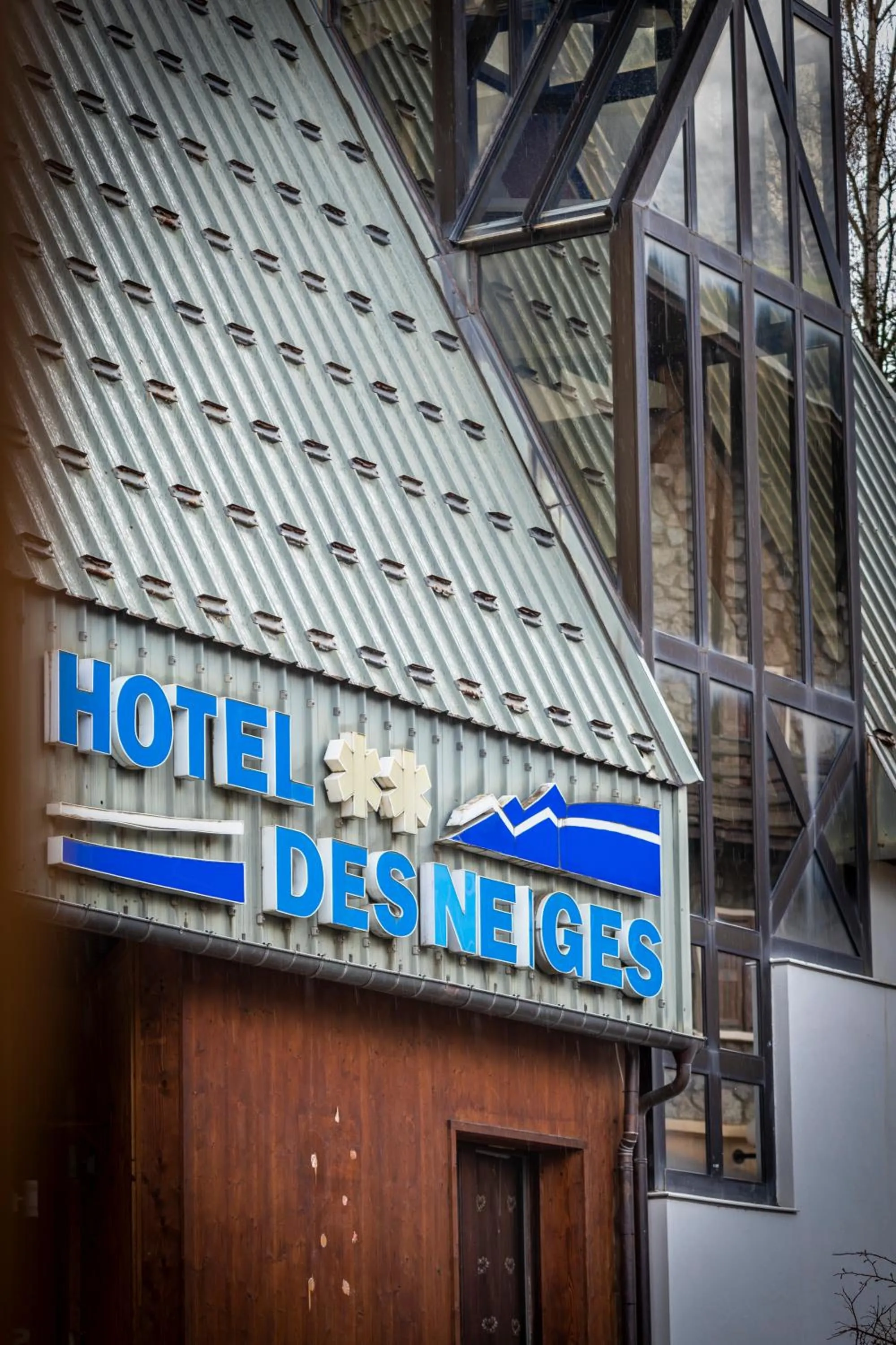 Property logo or sign in HOTEL DES NEIGES