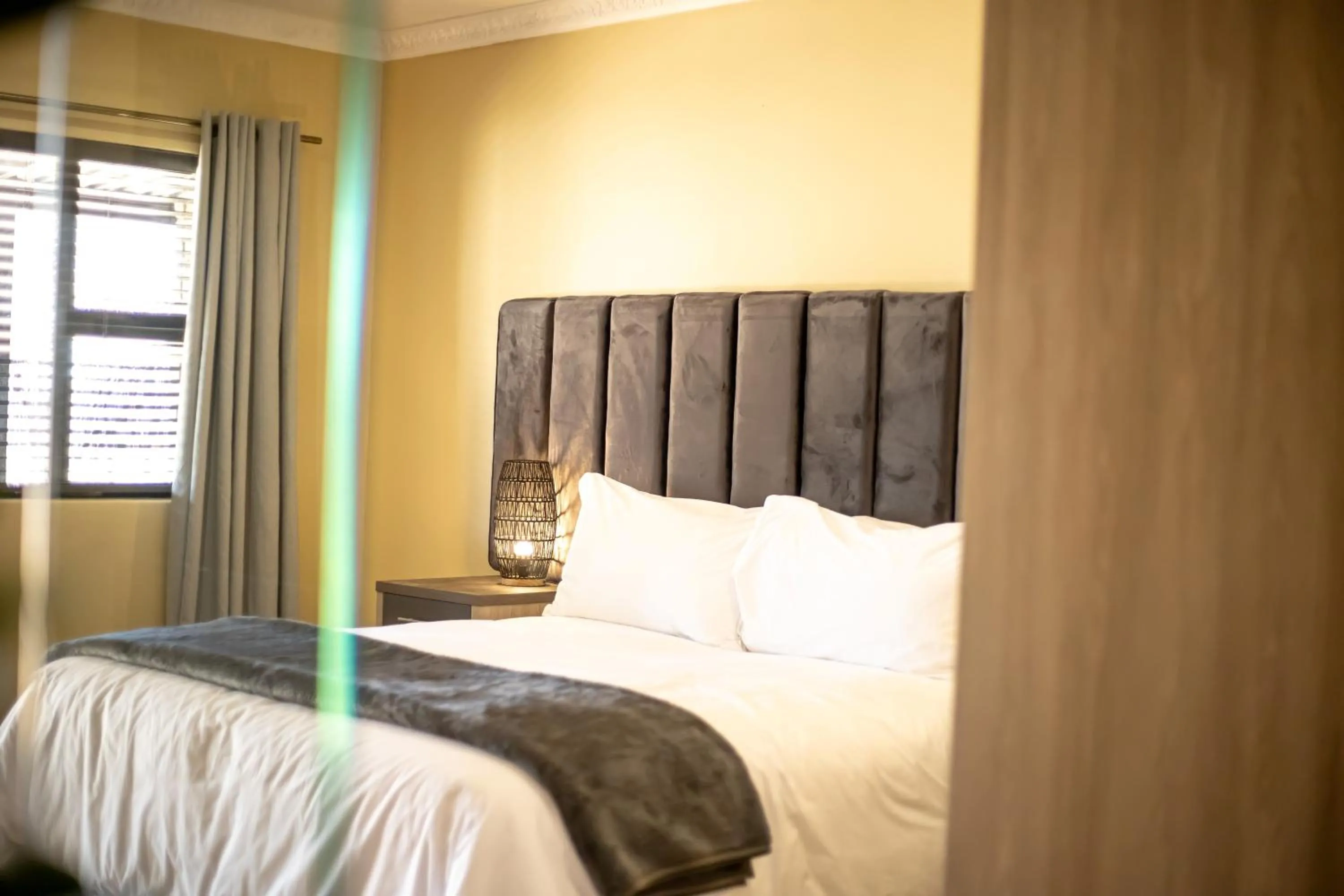 Bed in Shekinah Lion & Game Lodge