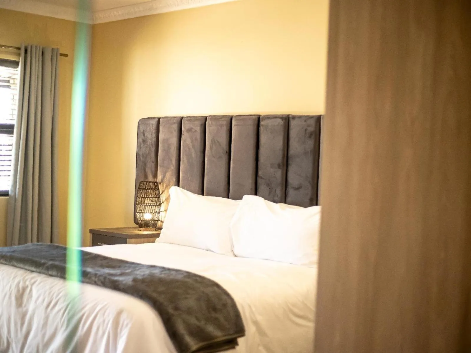 Bed in Shekinah Lion & Game Lodge