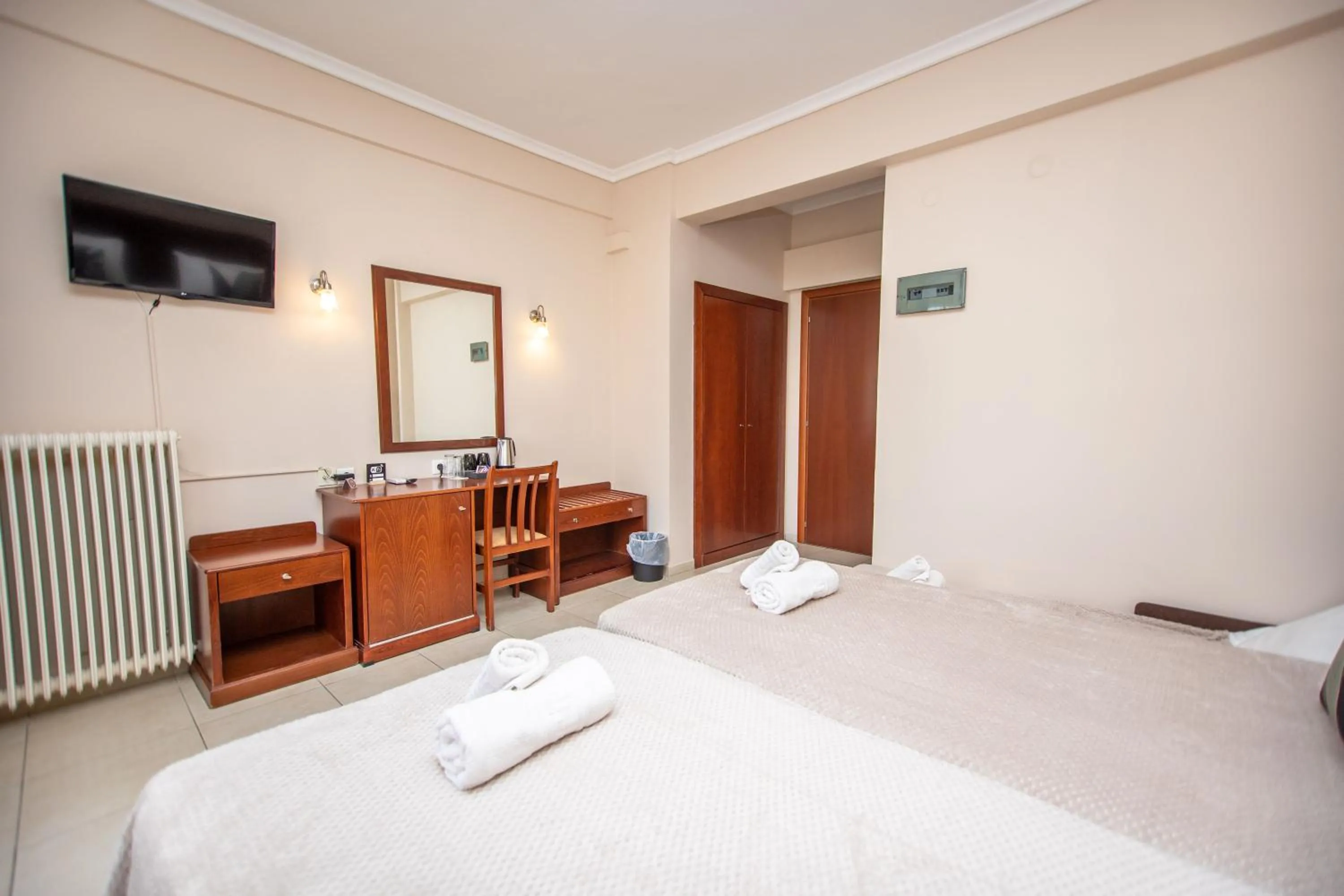 Bed in Hotel Strimoniko