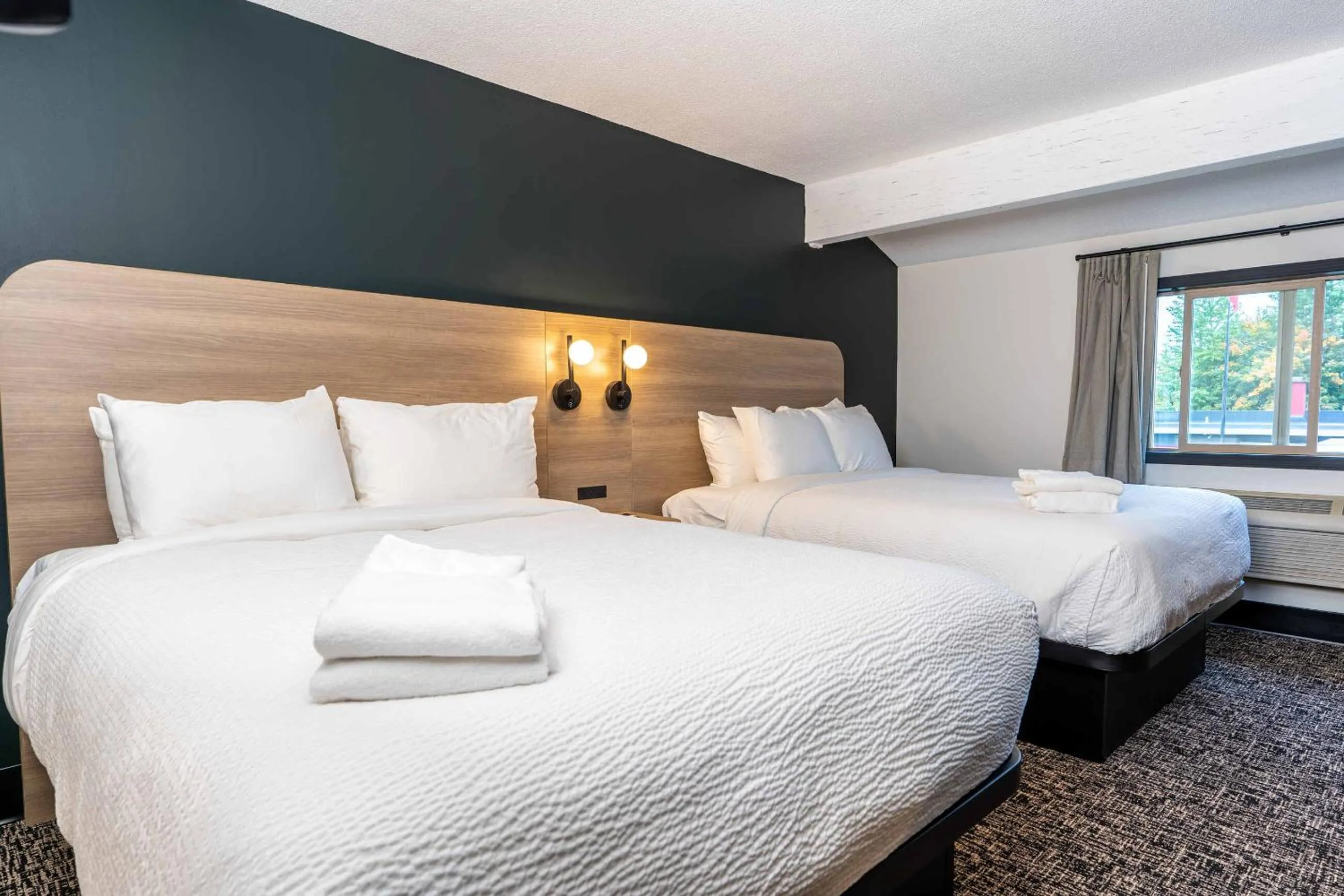 Bed in Northwinds Hotel Revelstoke