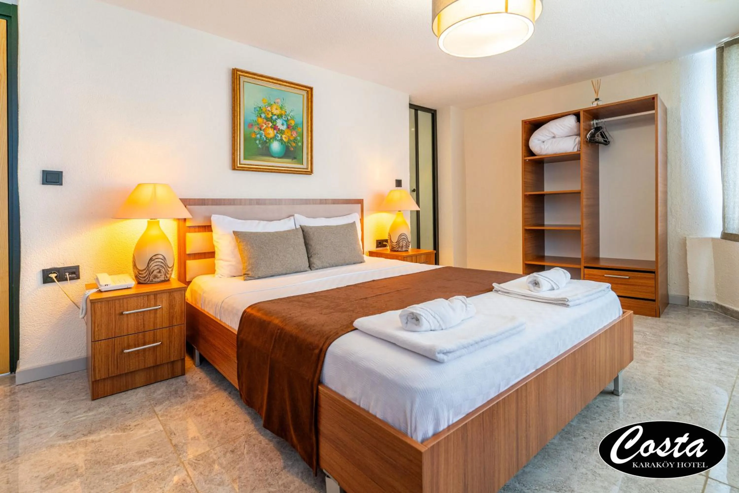 Bed in Costa Karakoy Hotel