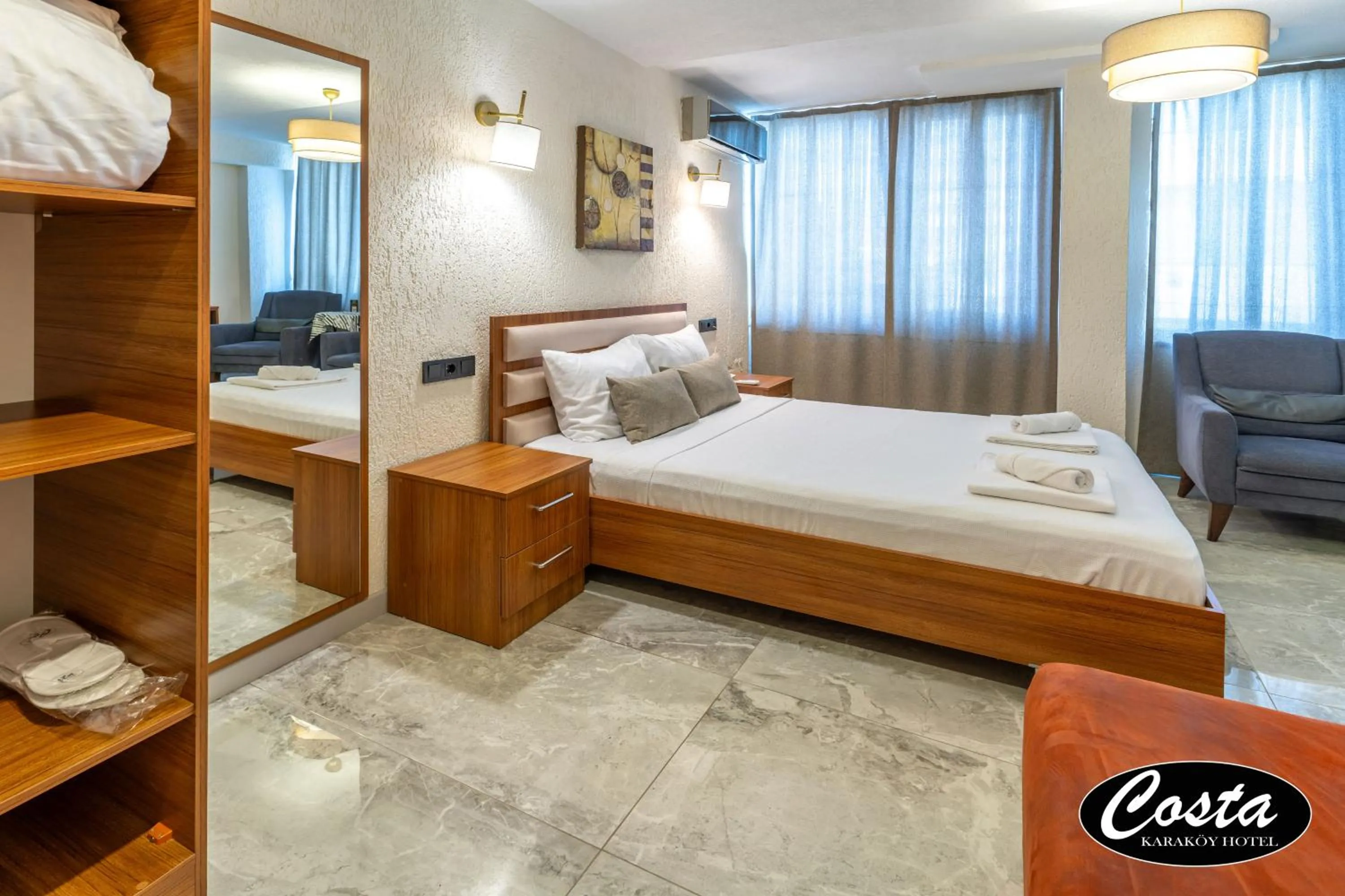 Bed in Costa Karakoy Hotel