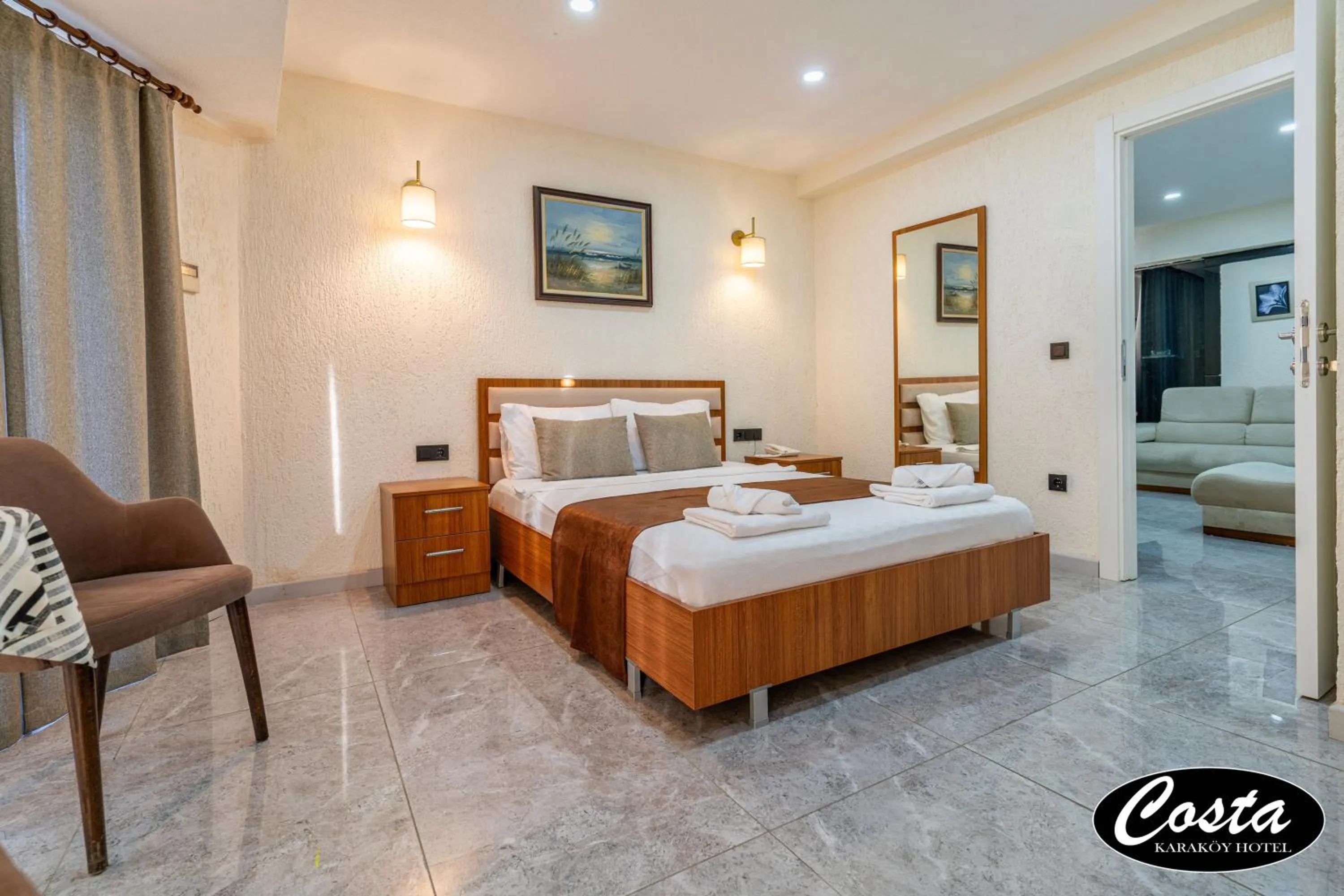 Bed in Costa Karakoy Hotel