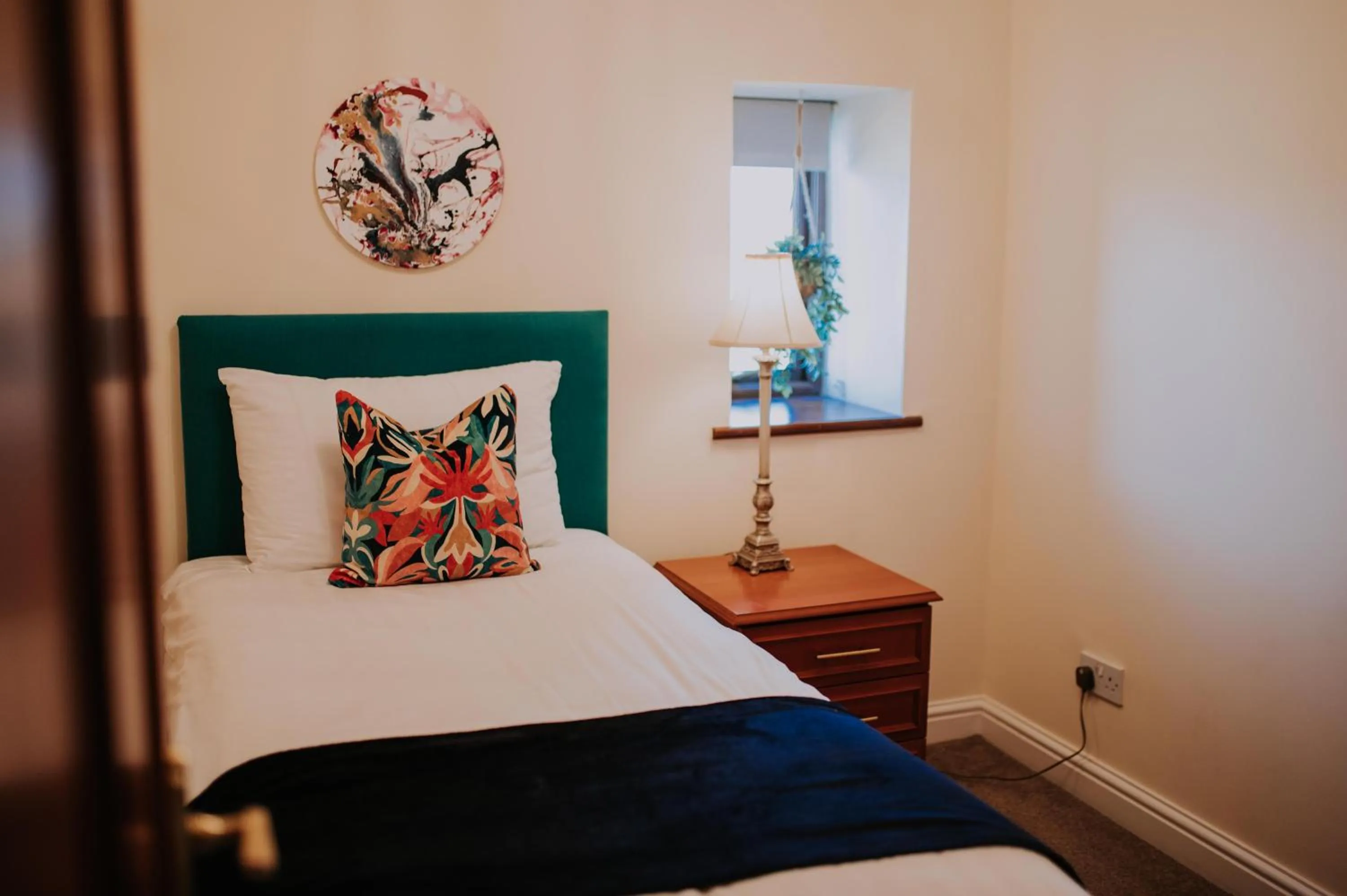 Bed in Pattys Barn Holiday Cottages, Cabins and Venue Hire