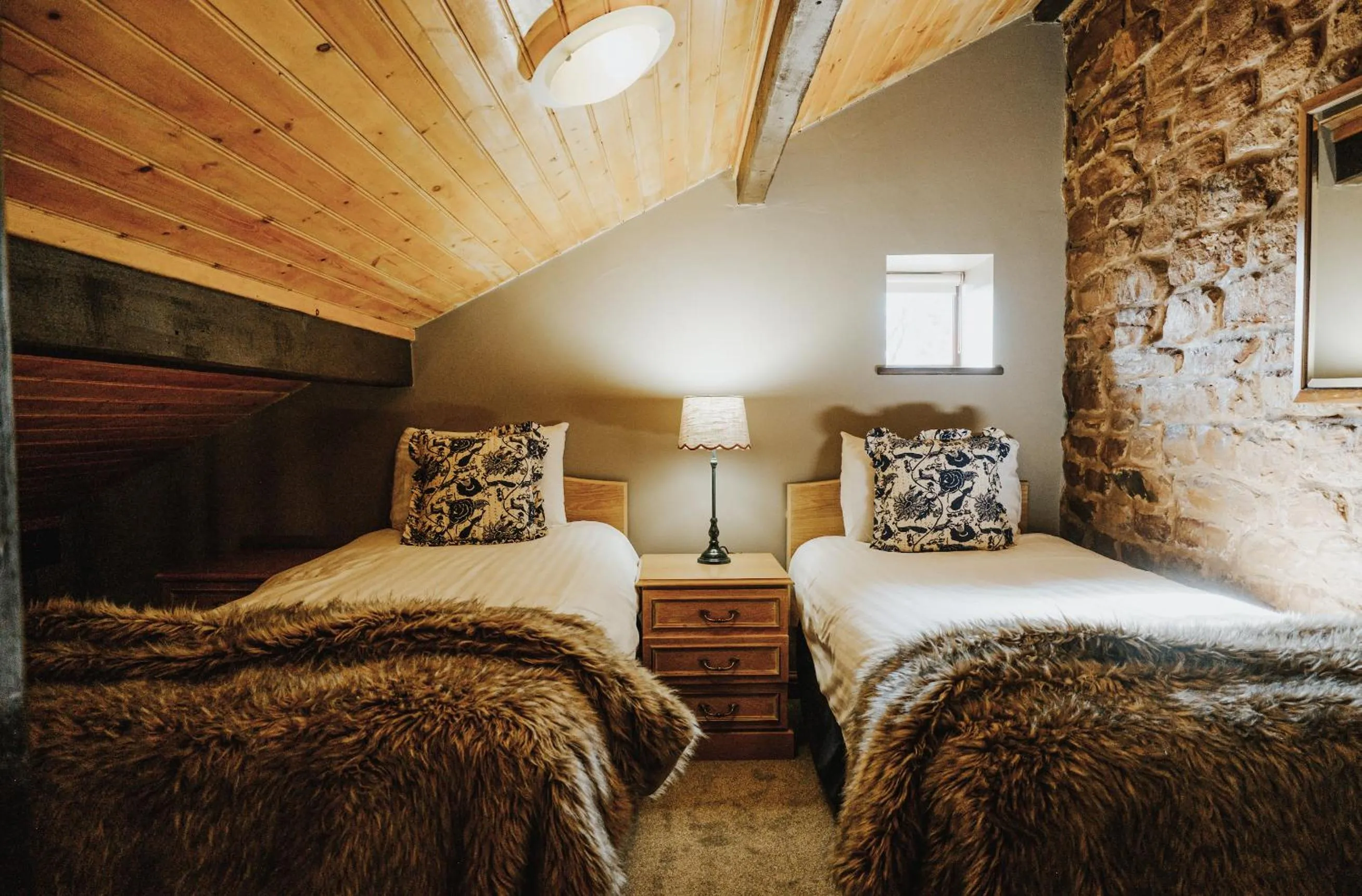 Bed in Pattys Barn Holiday Cottages, Cabins and Venue Hire