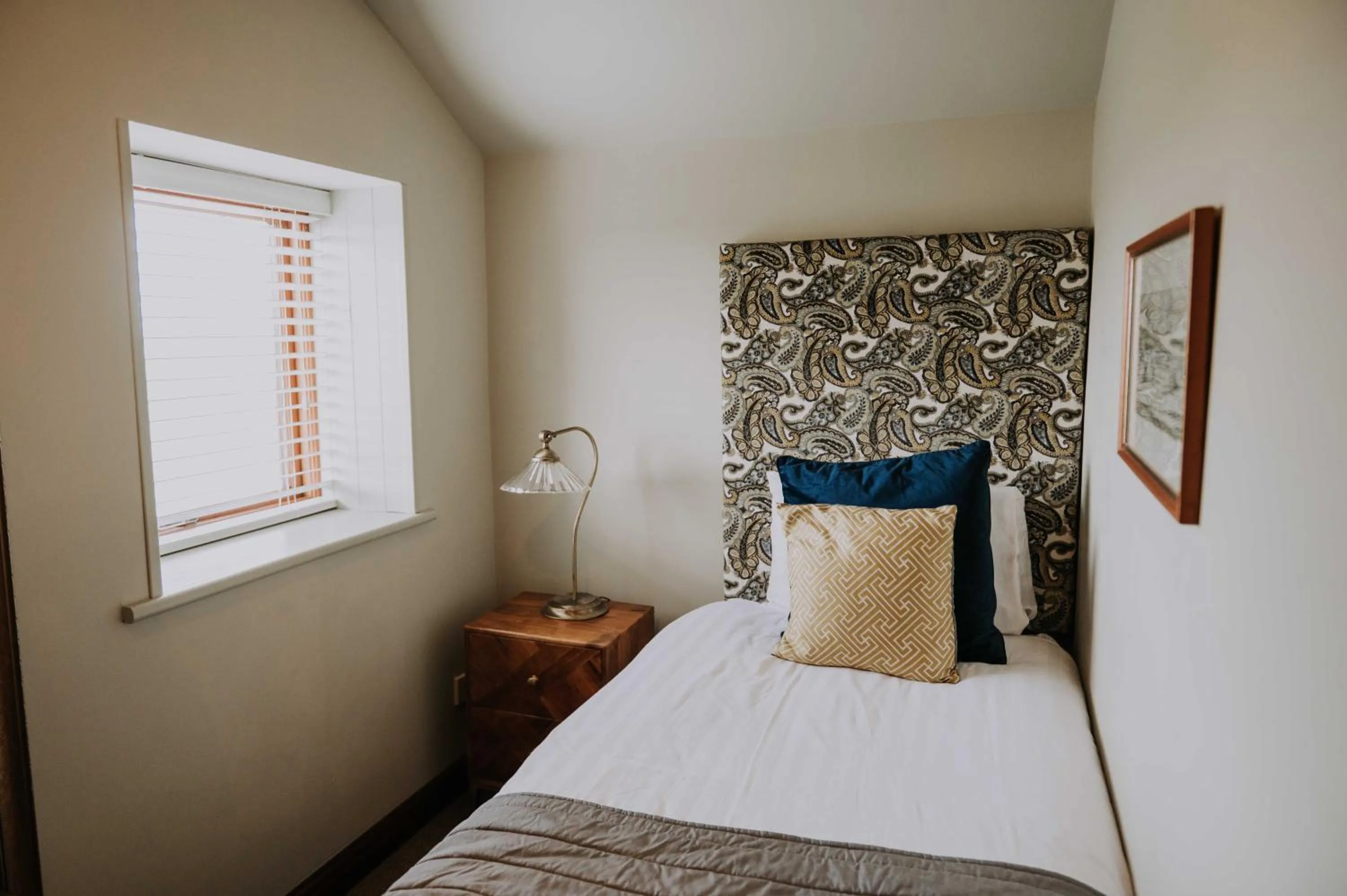 Bed in Pattys Barn Holiday Cottages, Cabins and Venue Hire
