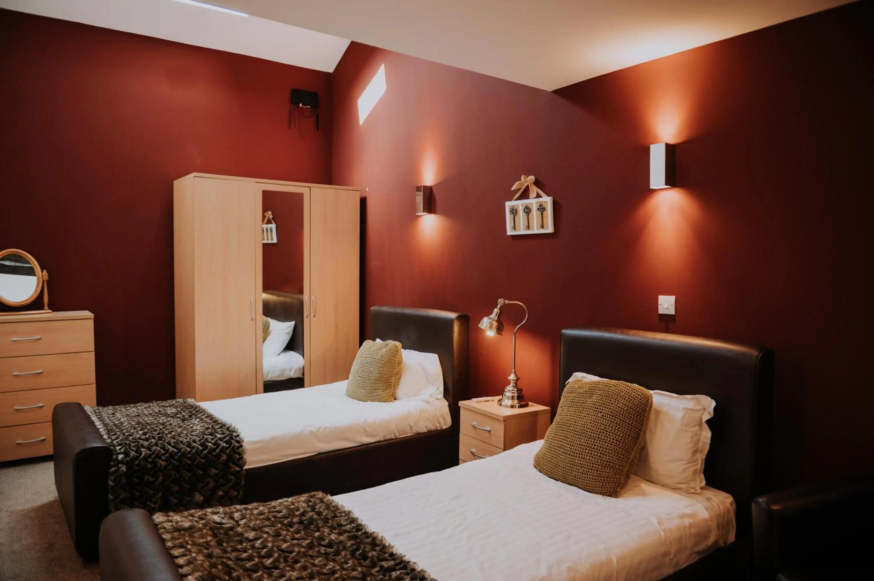 Bed in Pattys Barn Holiday Cottages, Cabins and Venue Hire