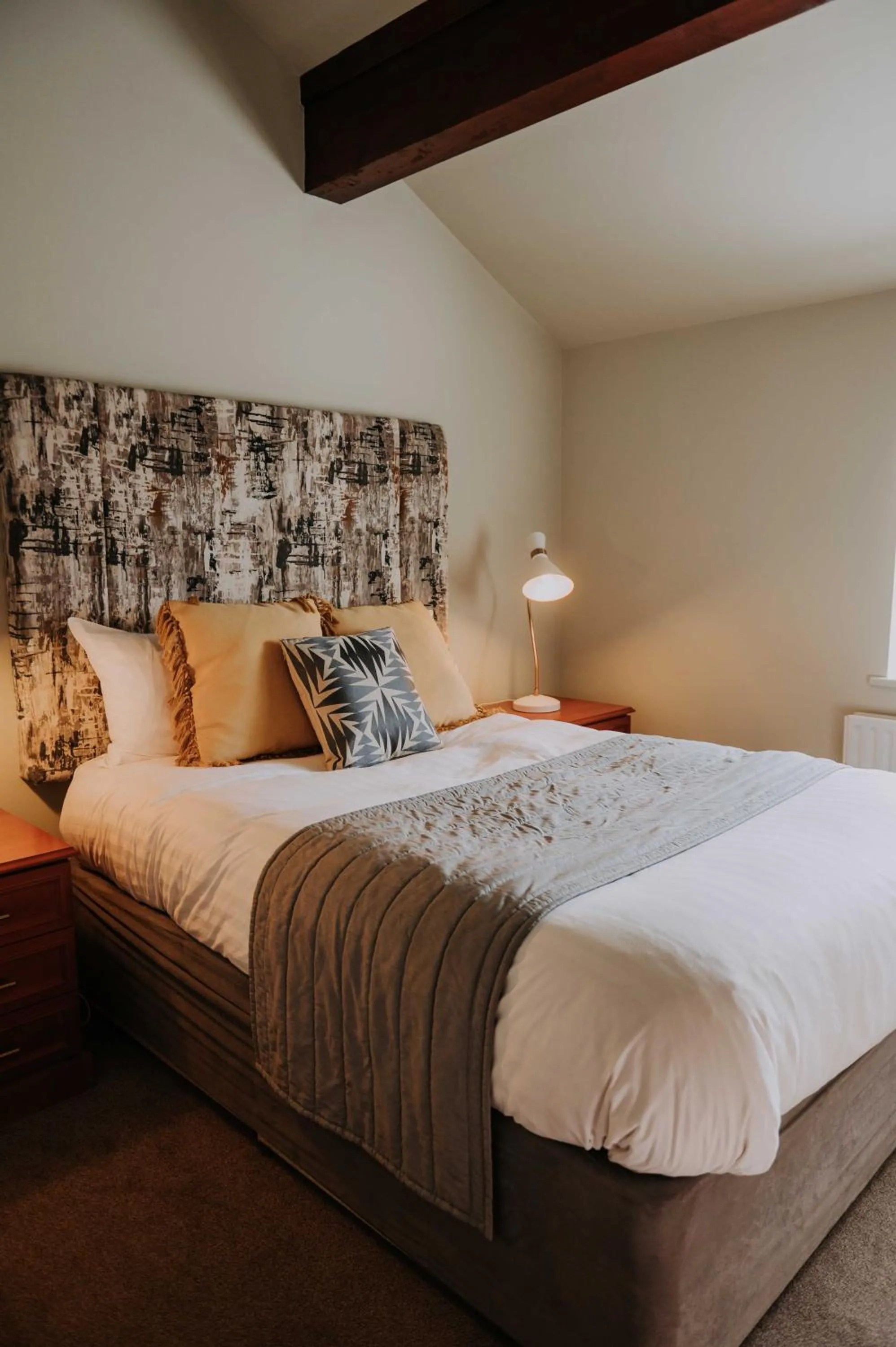 Bed in Pattys Barn Holiday Cottages, Cabins and Venue Hire