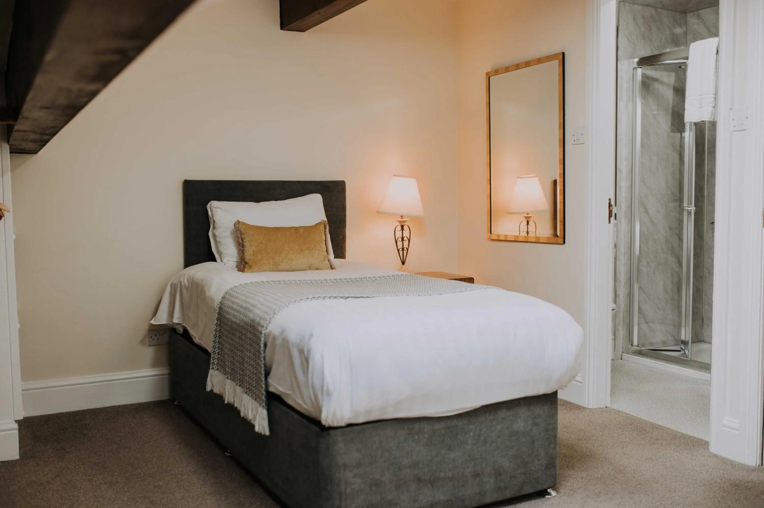 Bed in Pattys Barn Holiday Cottages, Cabins and Venue Hire