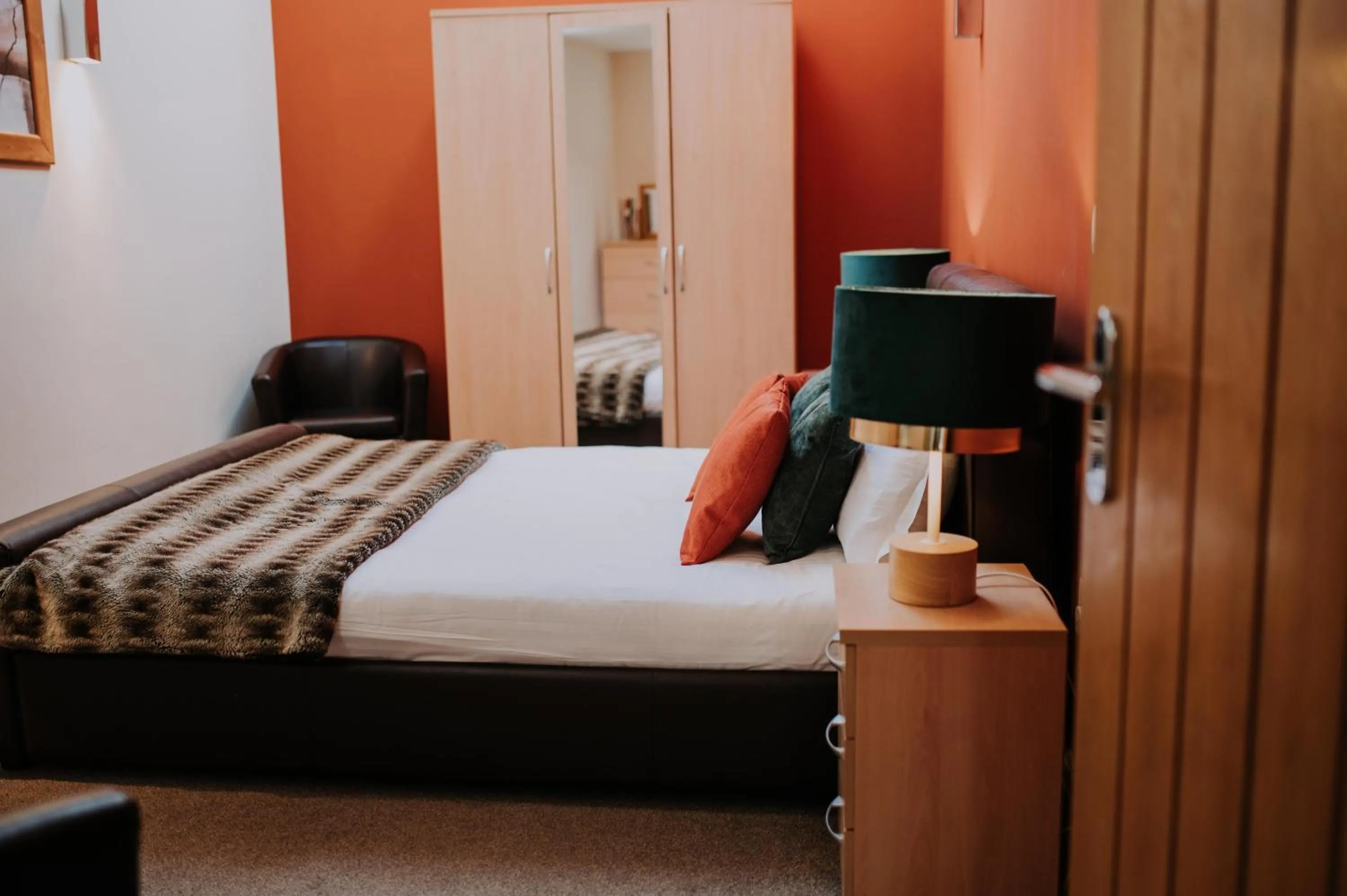 Bed in Pattys Barn Holiday Cottages, Cabins and Venue Hire