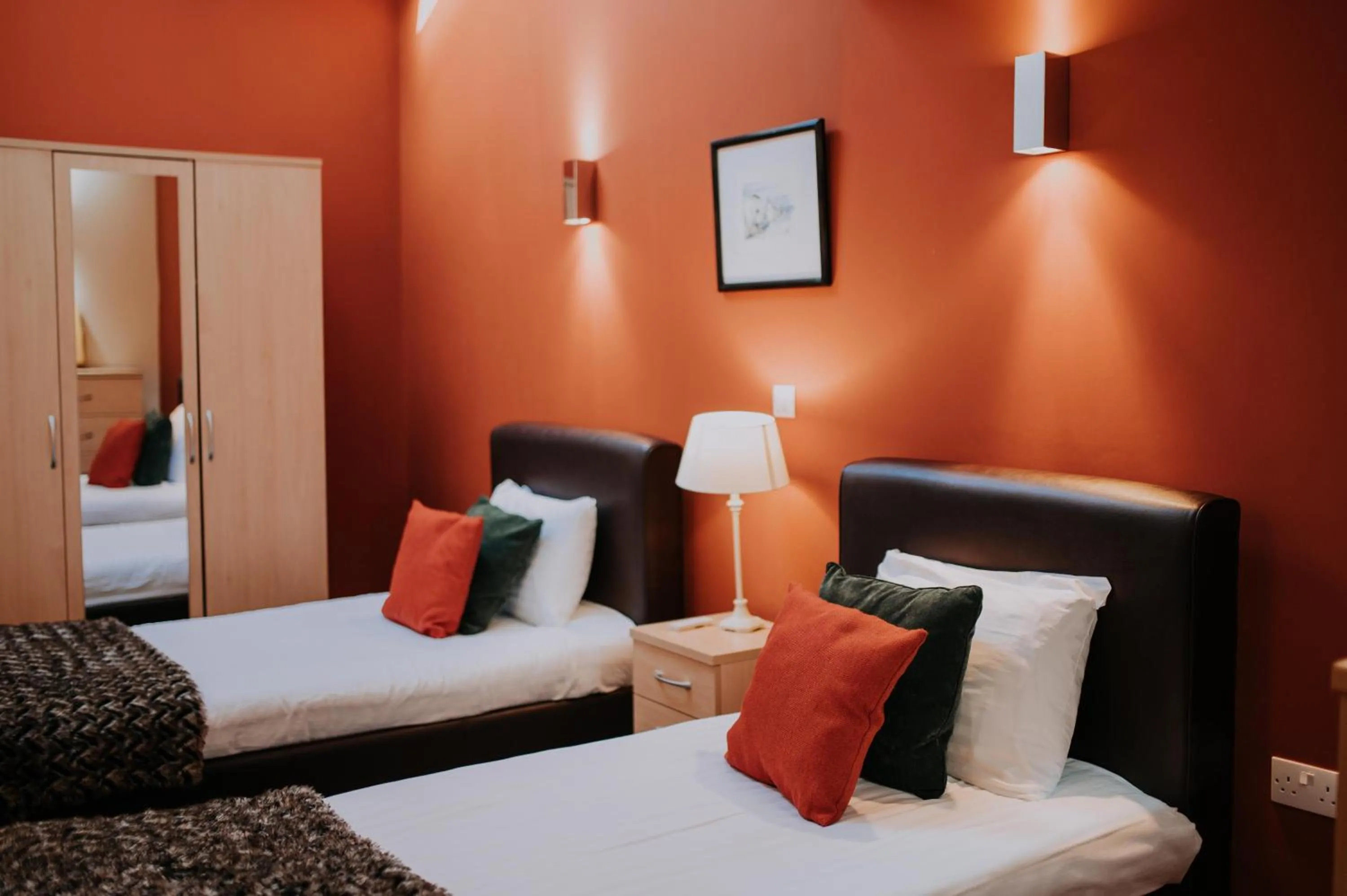 Bed in Pattys Barn Holiday Cottages, Cabins and Venue Hire