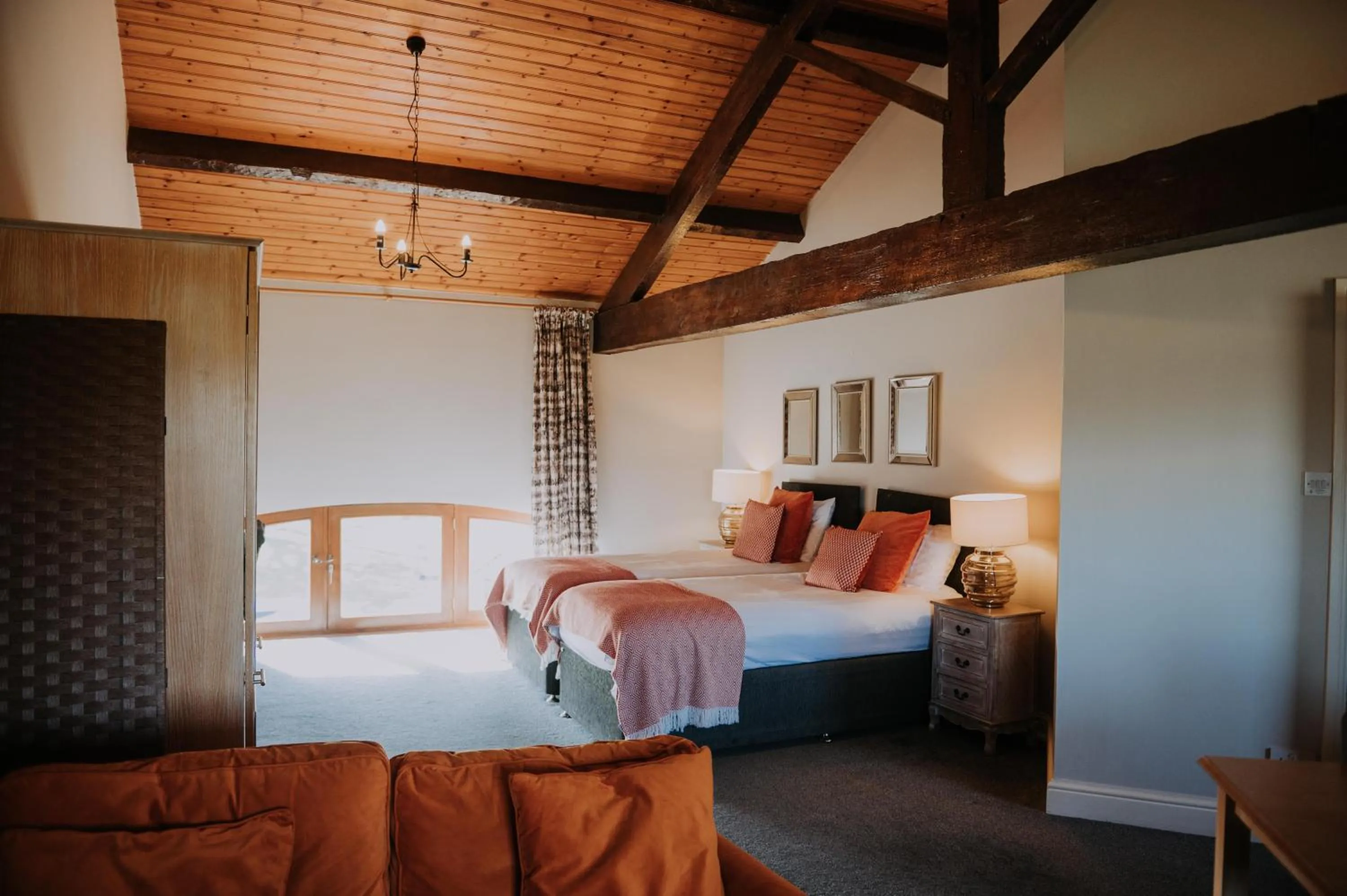 Bed in Pattys Barn Holiday Cottages, Cabins and Venue Hire