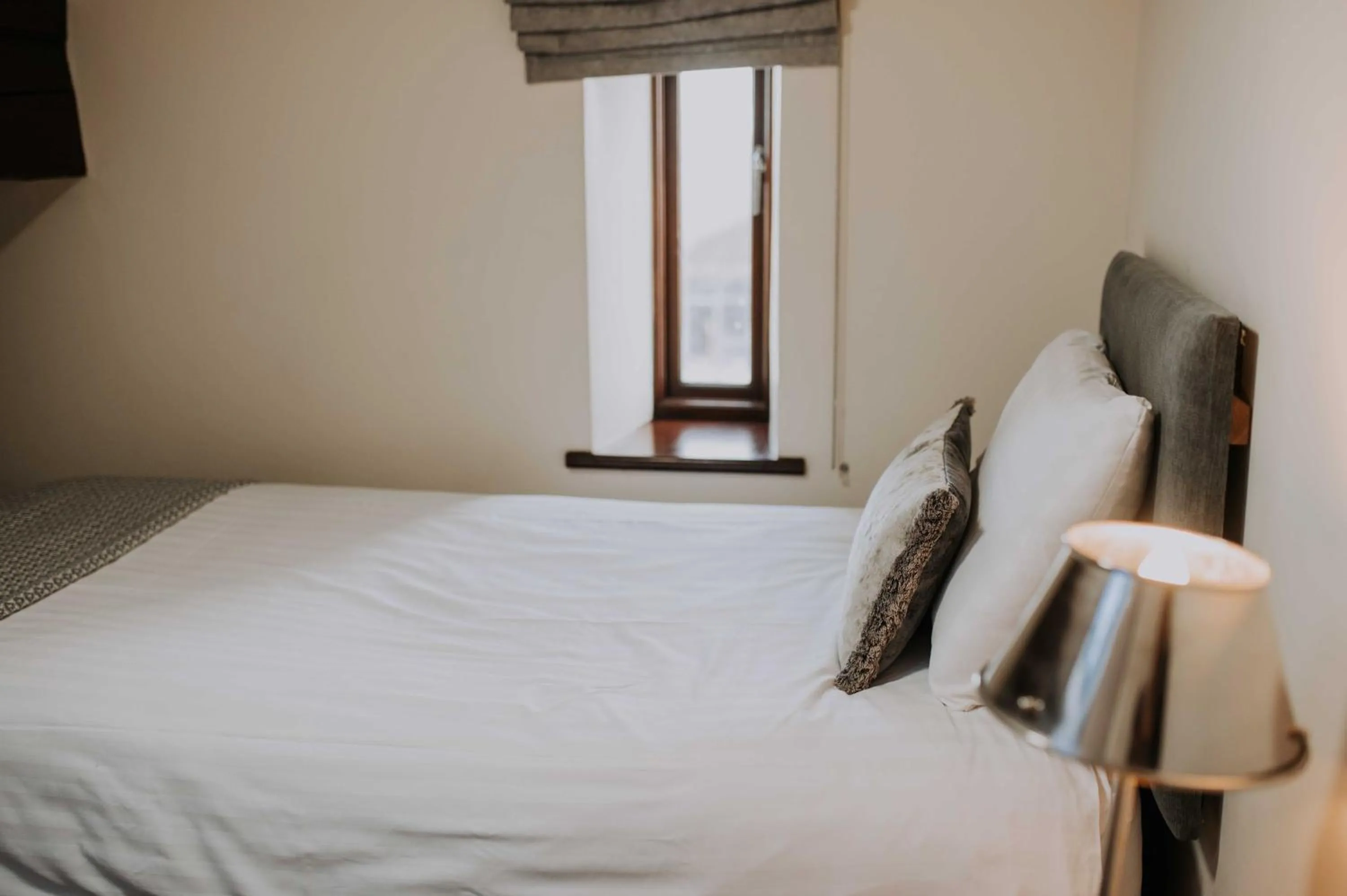 Bed in Pattys Barn Holiday Cottages, Cabins and Venue Hire