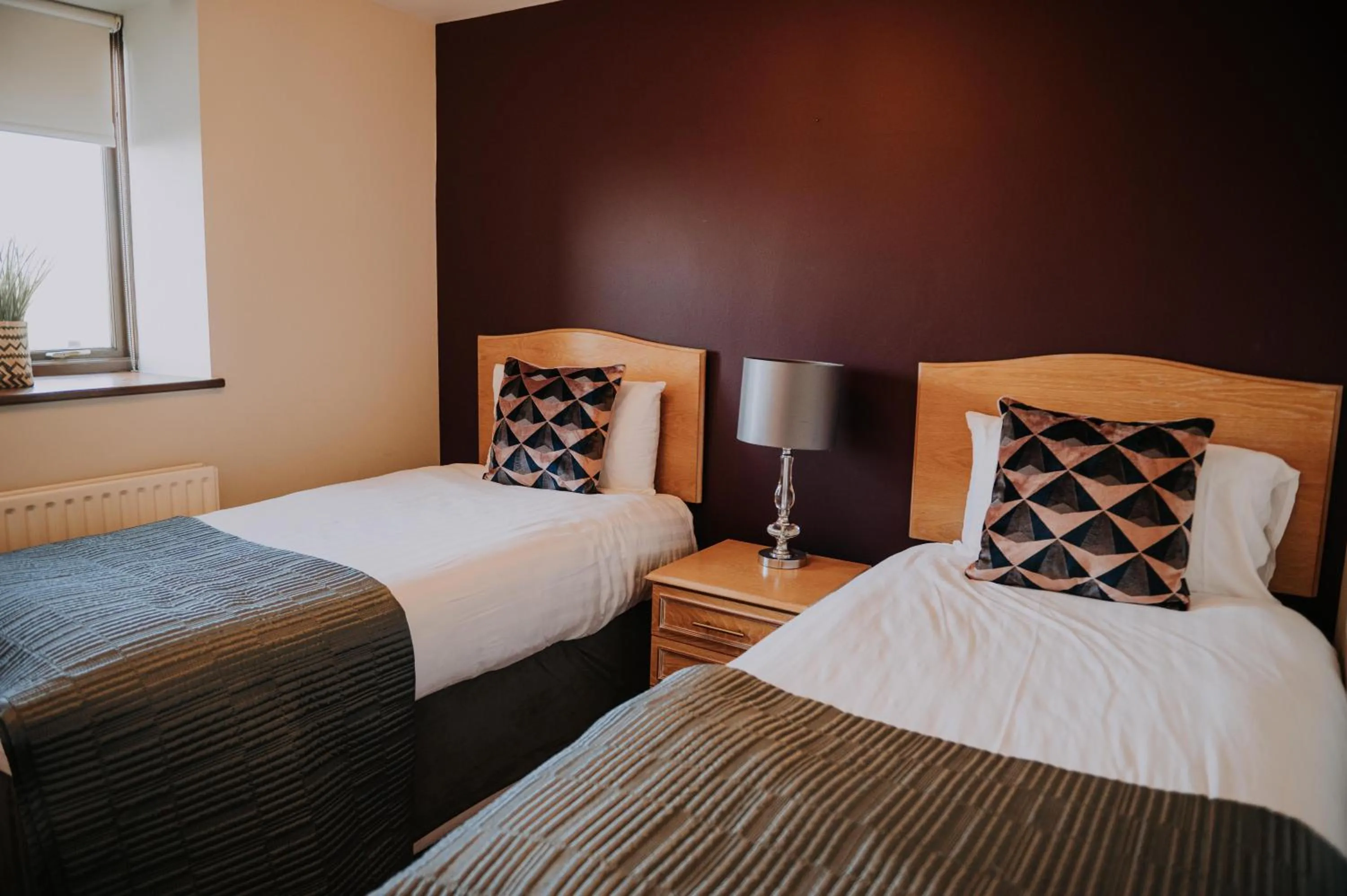 Bed in Pattys Barn Holiday Cottages, Cabins and Venue Hire