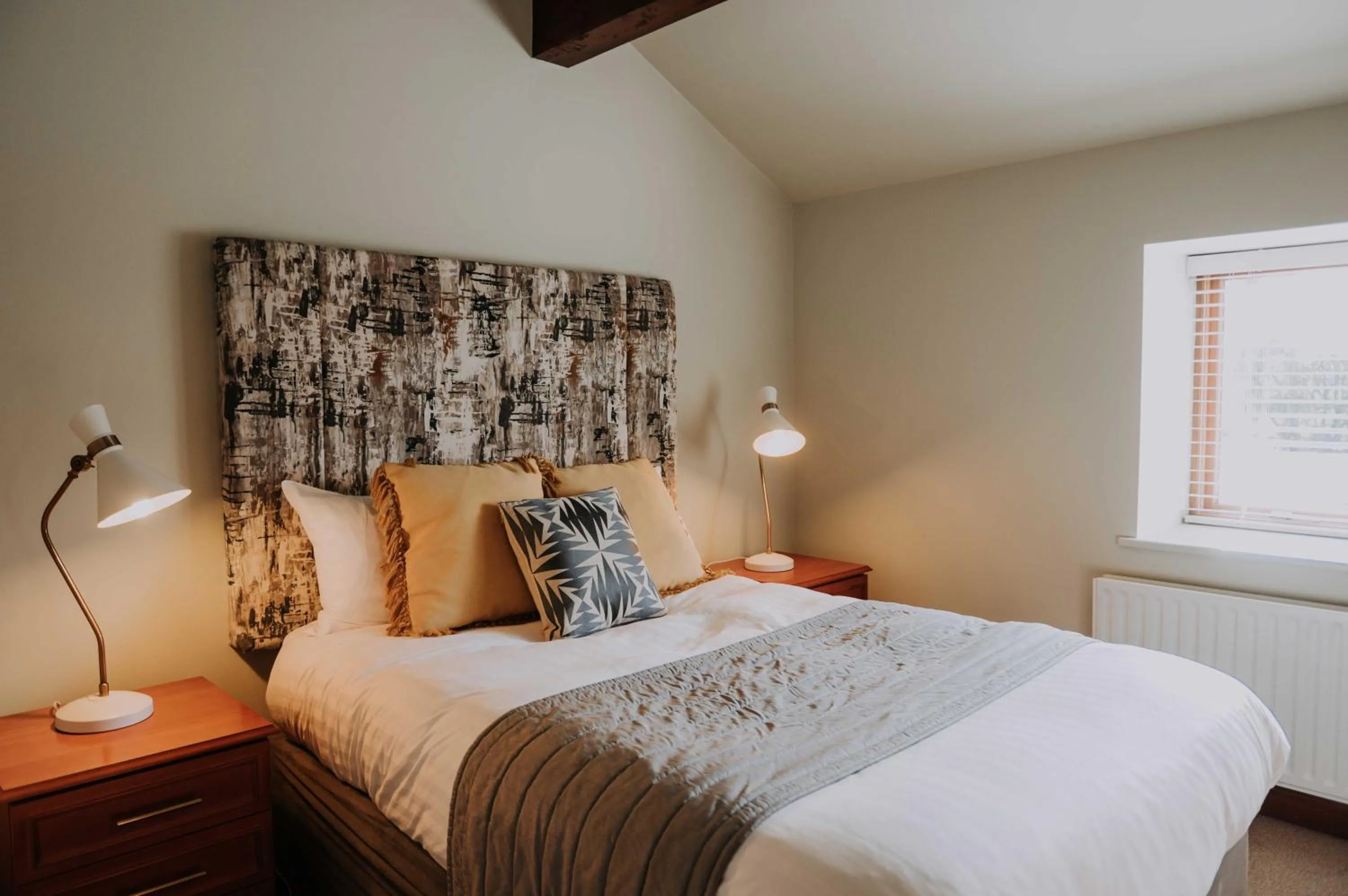 Bed in Pattys Barn Holiday Cottages, Cabins and Venue Hire