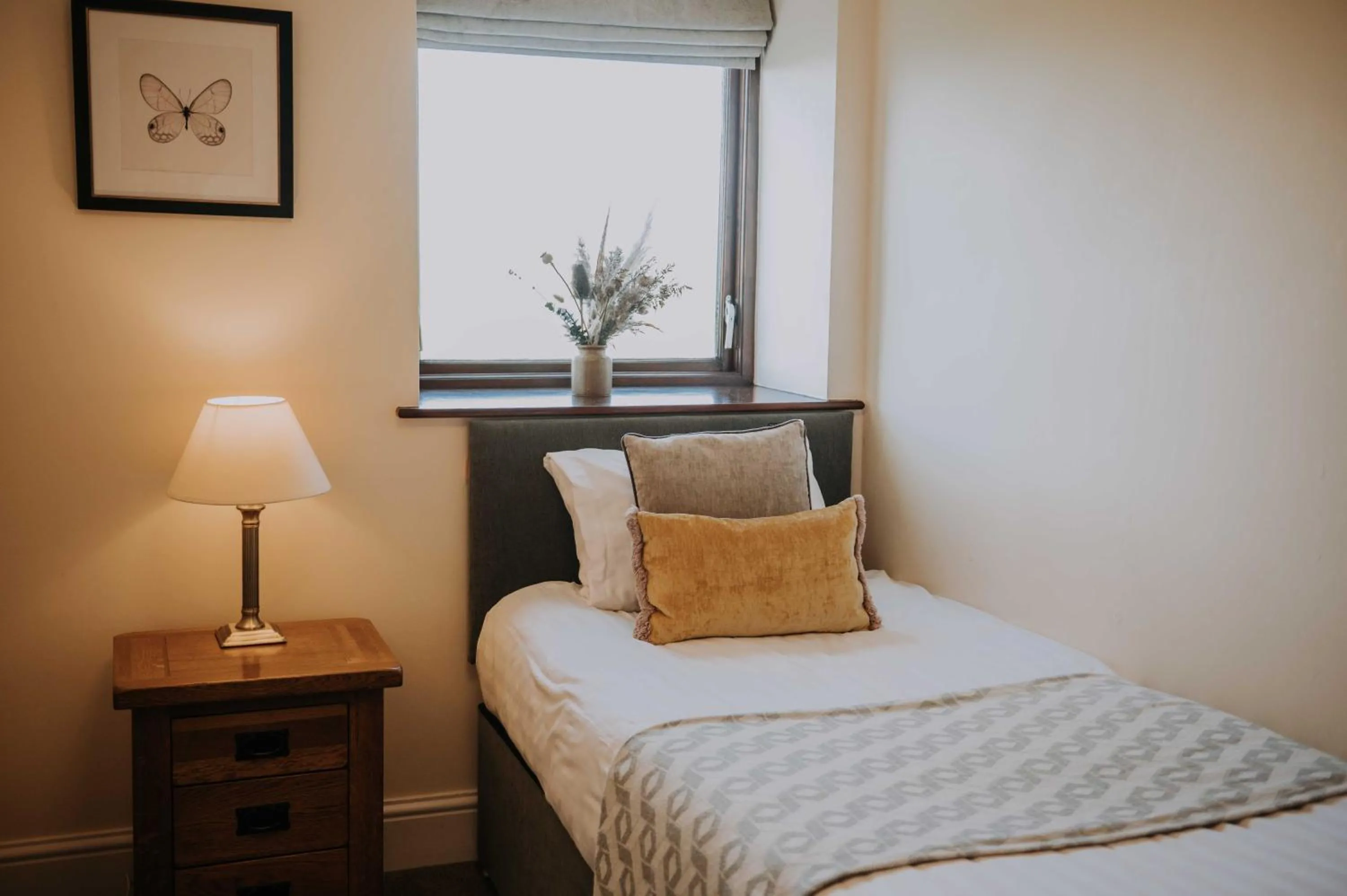 Bed in Pattys Barn Holiday Cottages, Cabins and Venue Hire