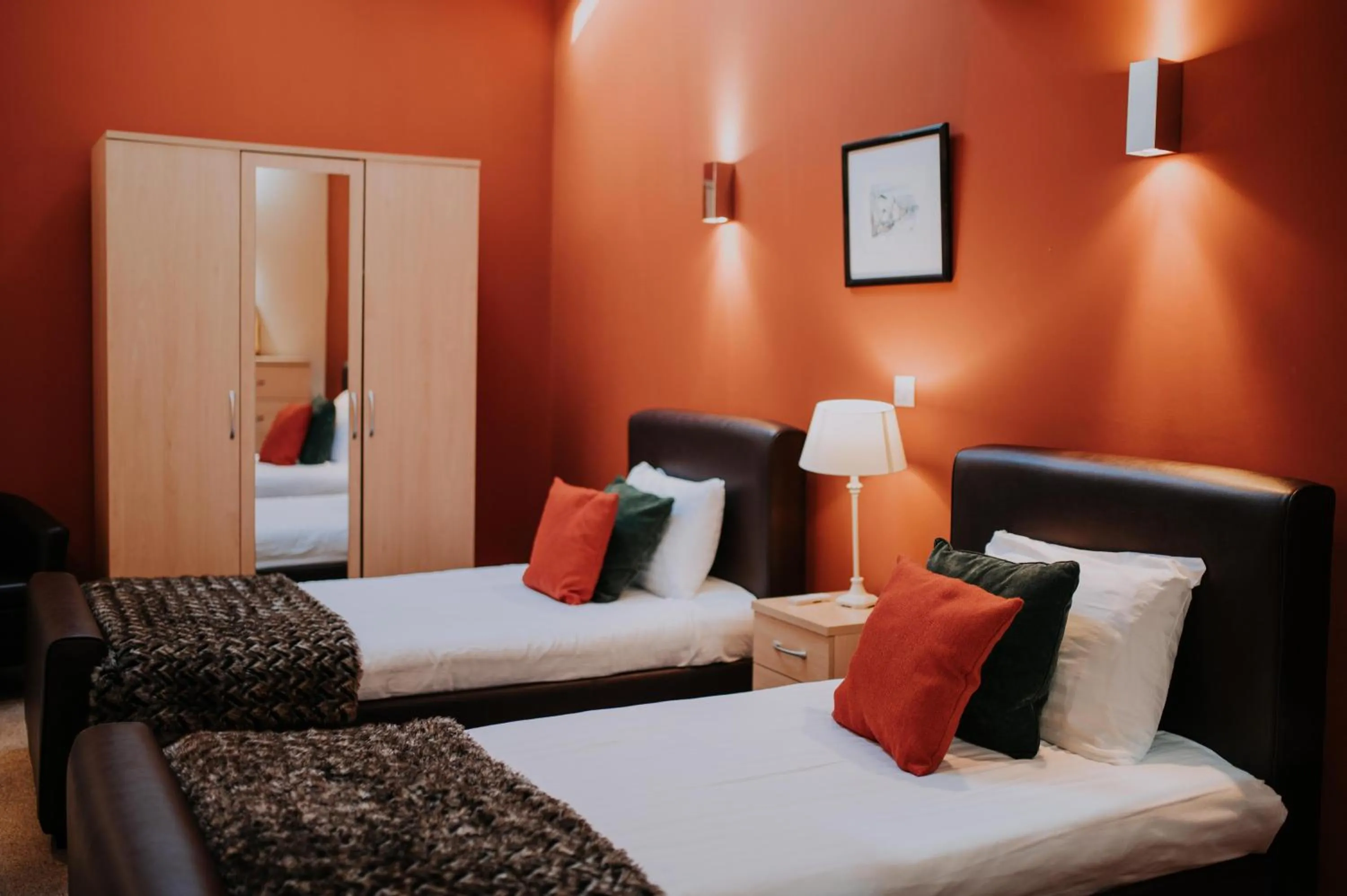 Bed in Pattys Barn Holiday Cottages, Cabins and Venue Hire