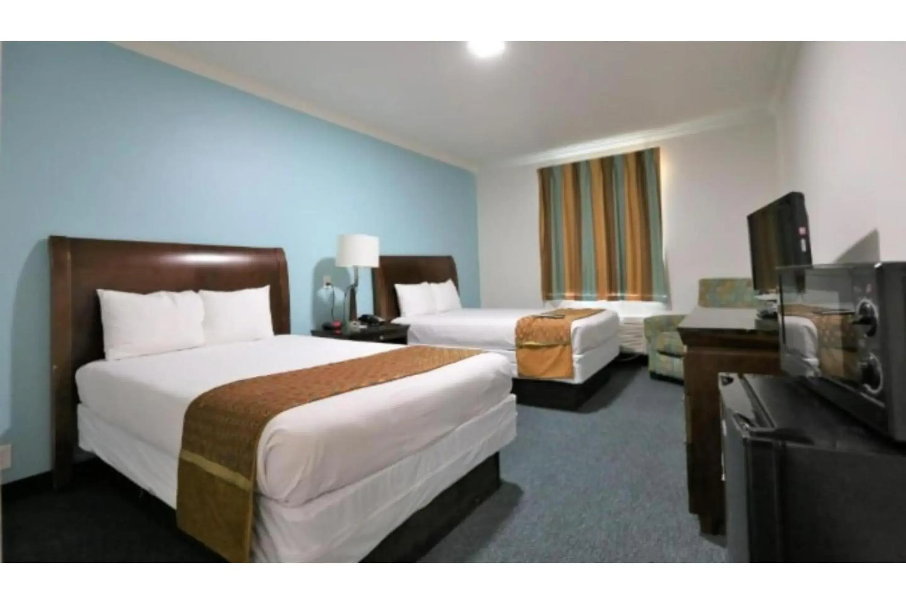 Bedroom, Bed in Hotel O Executive Inn & Suites Cuero Hwy 87 Bedroom, Bed in Hotel O Executive Inn & Suites Cuero Hwy 87