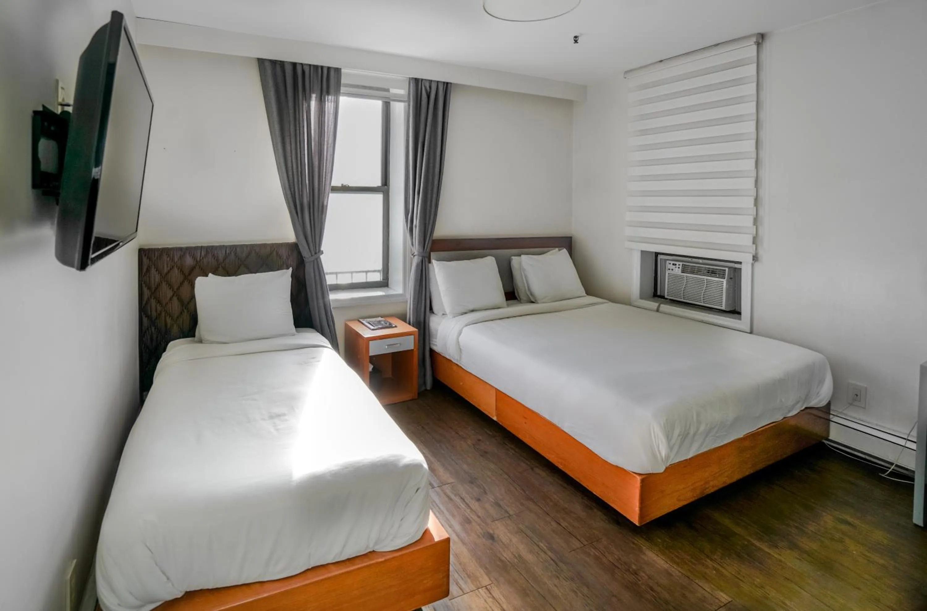 Bed in Midtown West Hotel