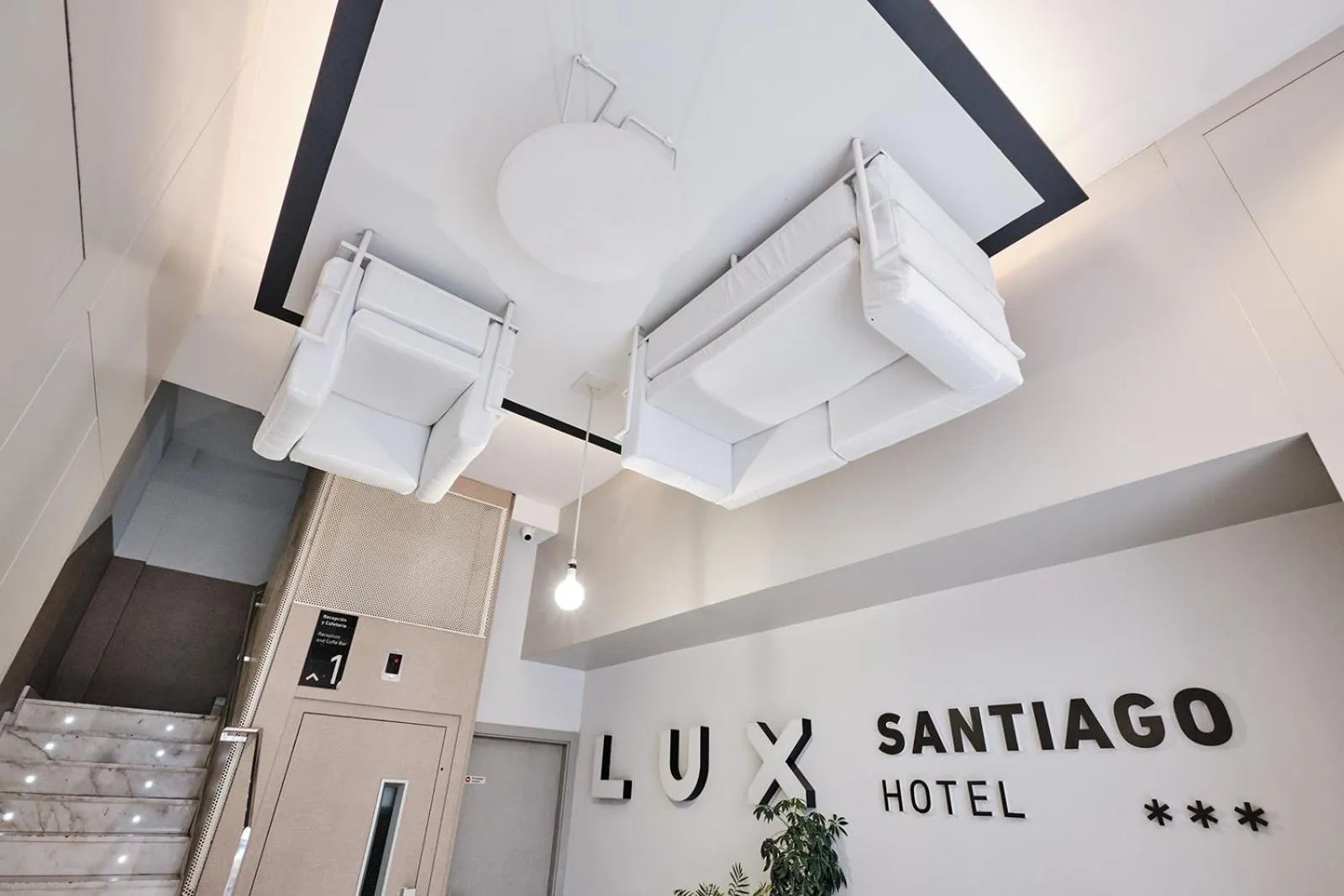 Lobby or reception in Hotel Lux Santiago