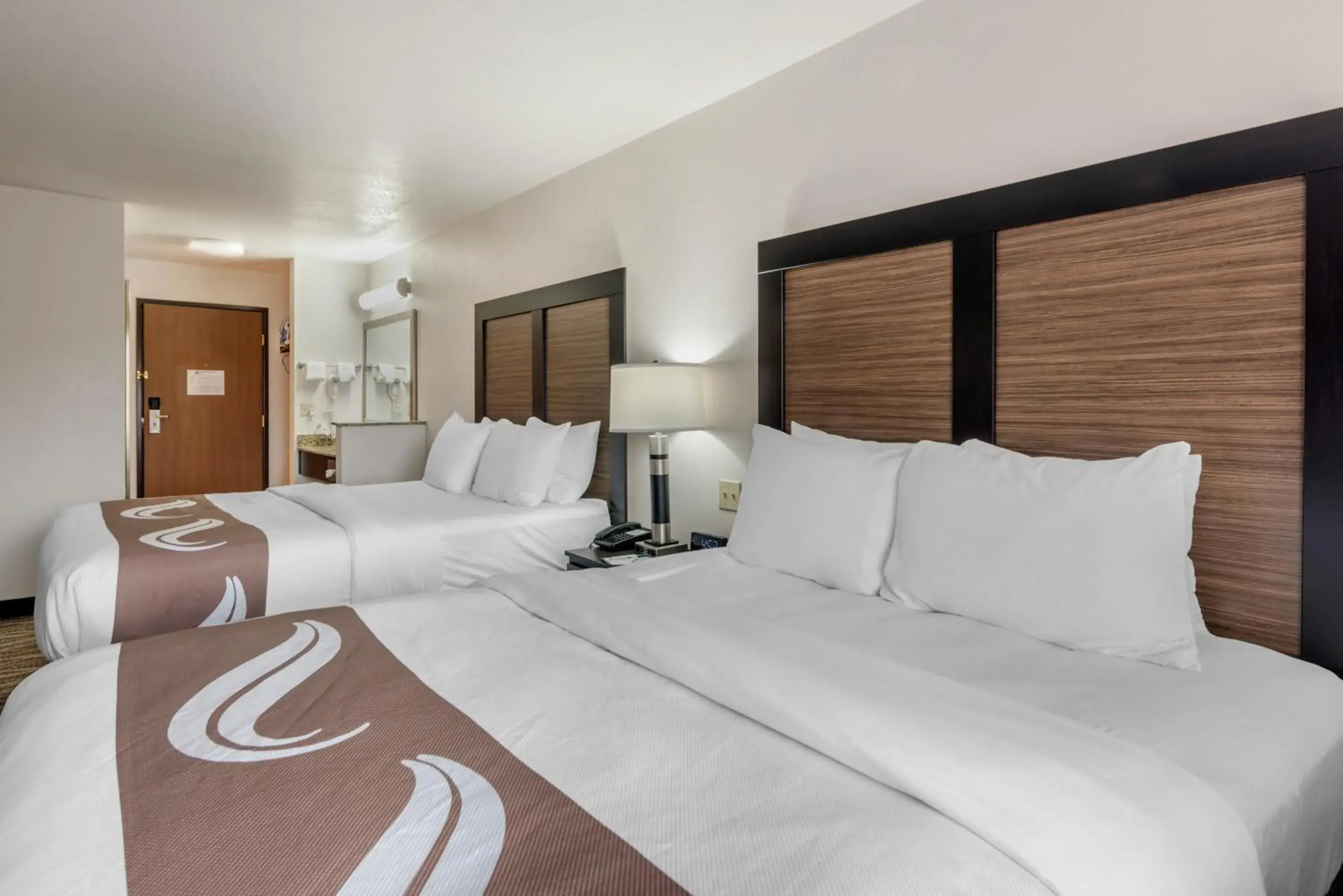 Bed in Quality Inn & Suites Bed in Quality Inn & Suites