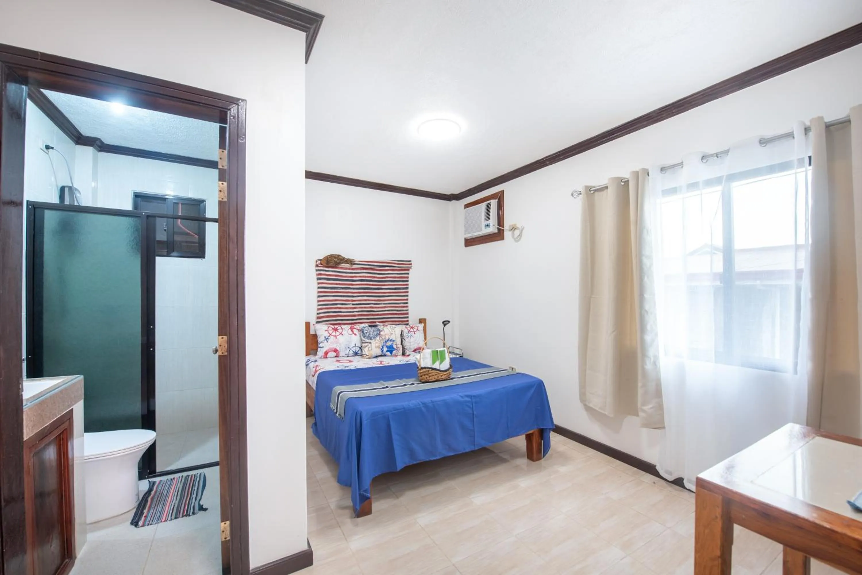 Bathroom, Bed in Siesta Siargao